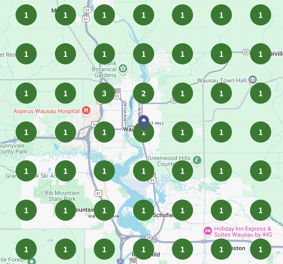 Map of Wausau, Wisconsin area showing multiple green markers with the number 1, representing available parking spaces, with some markers indicating larger parking areas with the numbers 2 and 3.
