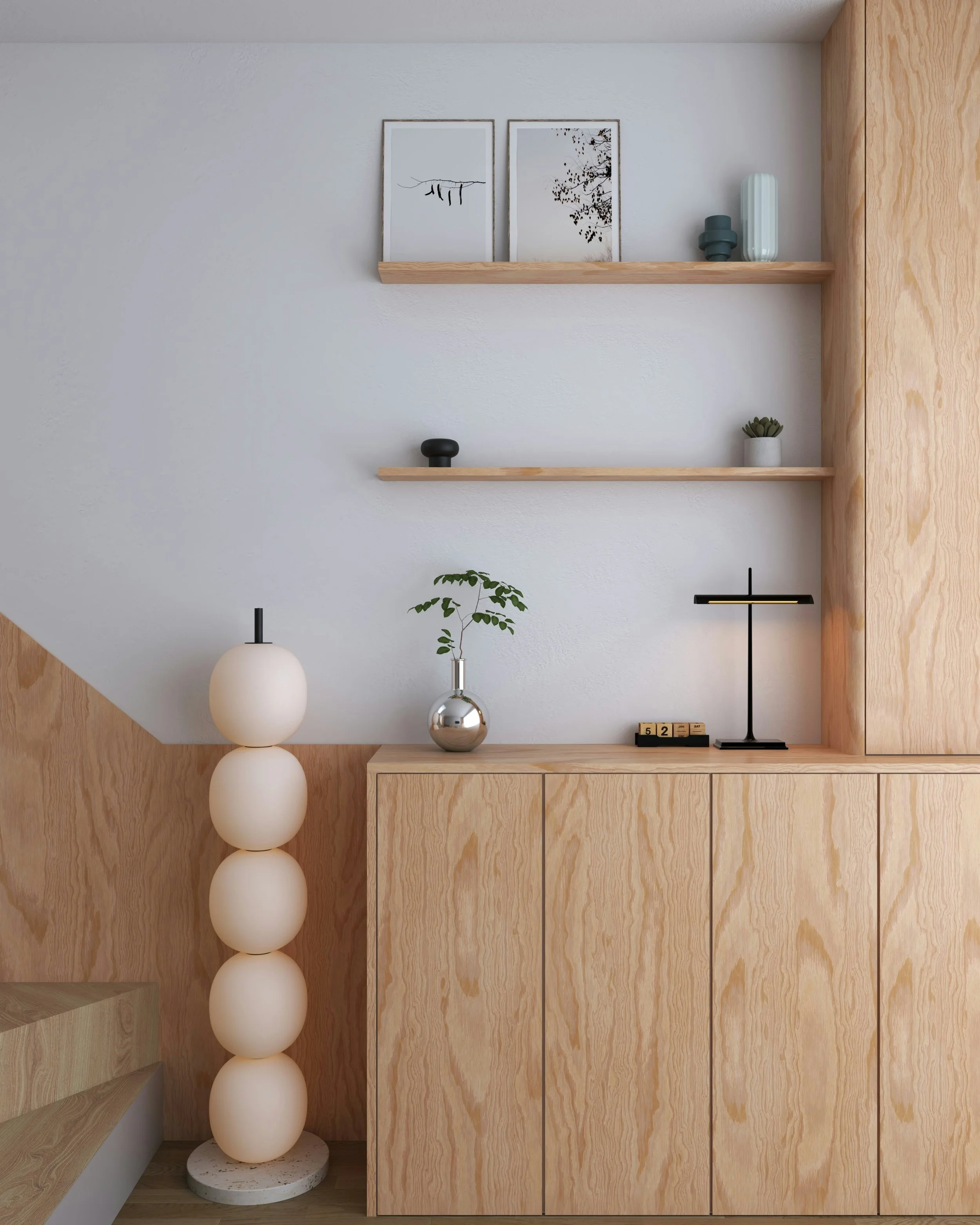 Interior with wooden cabinetry, open shelving, vases, framed art, and a modern table lamp.