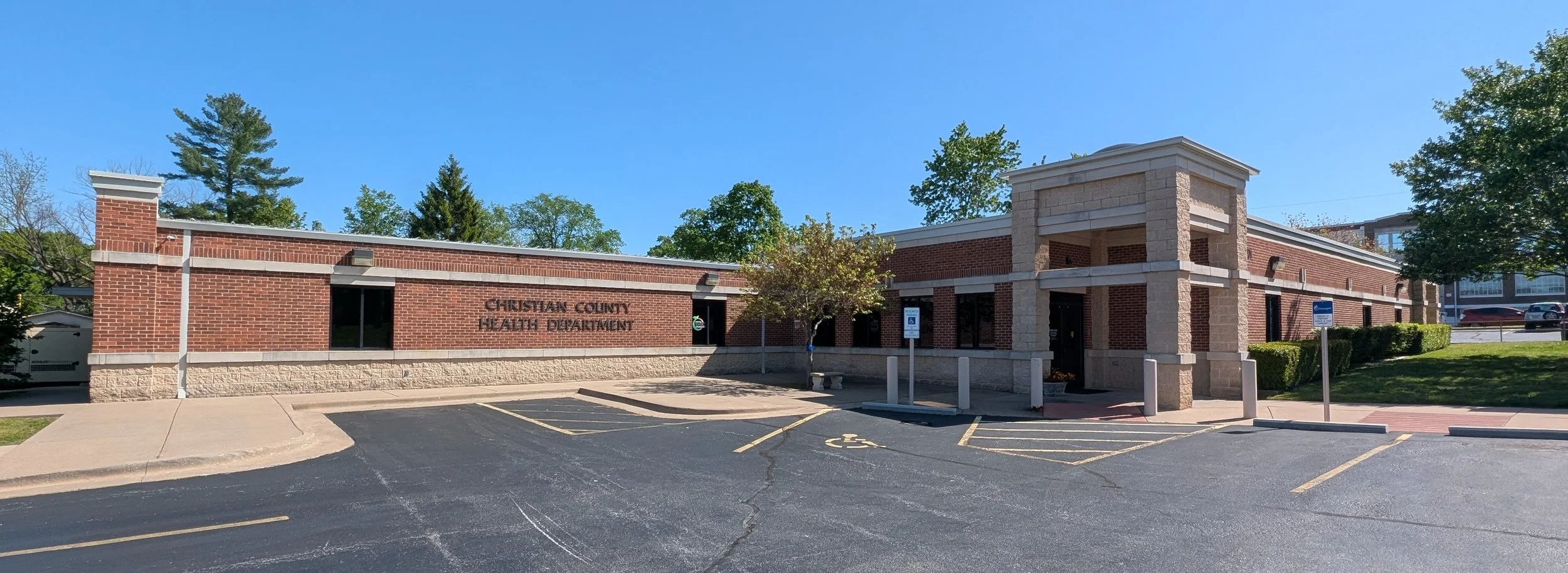 View of the Christian County Health Department building from the parking lot