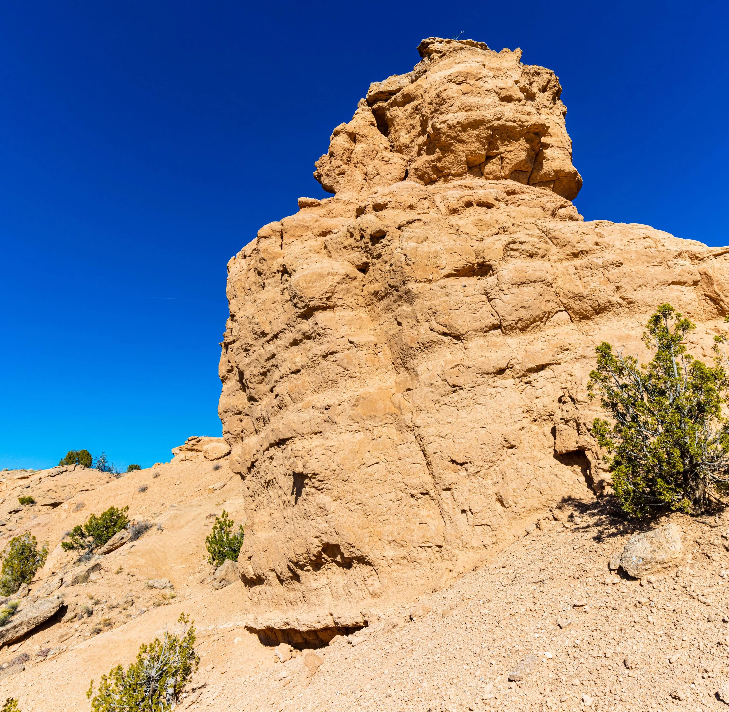 Woman mountain bike rider, Nambe Badlands trails, Santa Fe, New Mexico, guided rides