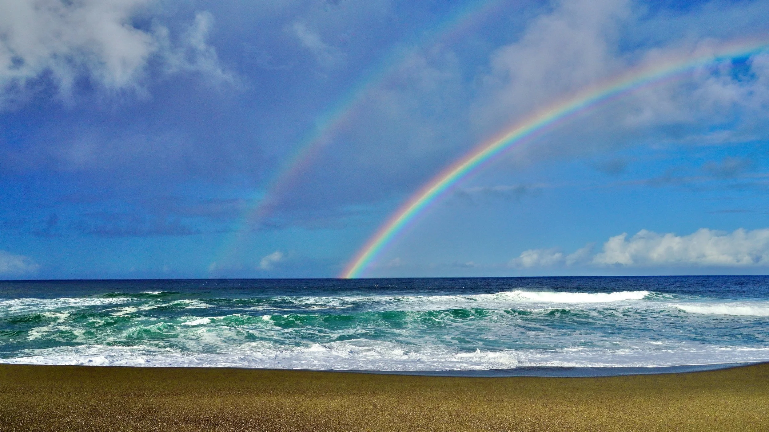 Rainbow Over the Sea