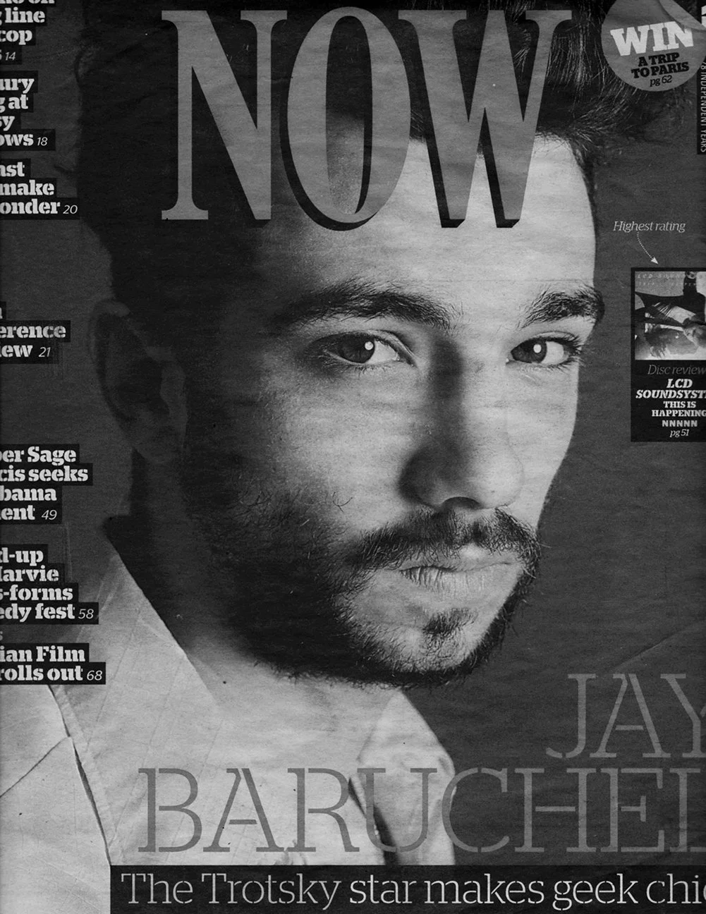 Black and white magazine cover featuring a close-up portrait of a man with a beard and short hair, the word 'NOW' above his eyebrows, and 'JAY BARUCHEL' at the bottom, with a subtitle 'The Trotsky star makes geek chic'.