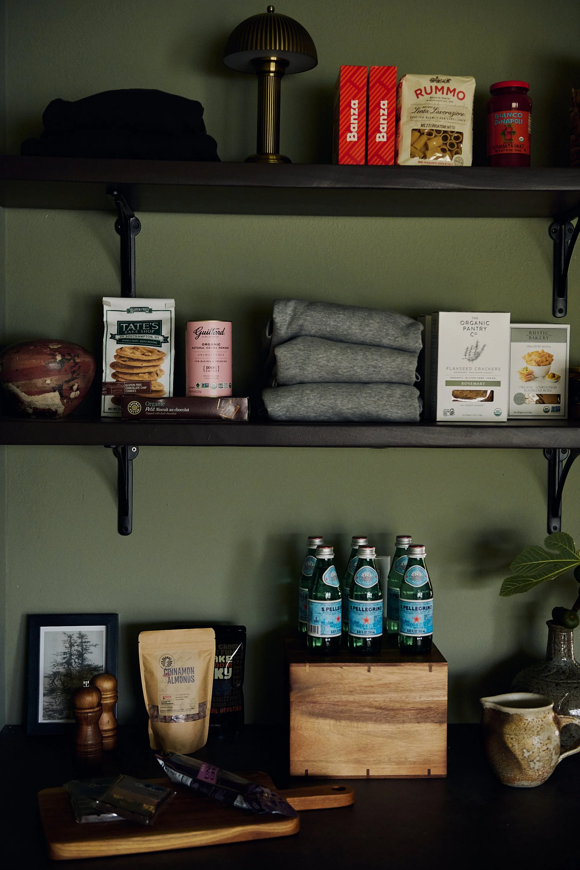 books and bottles on shelf