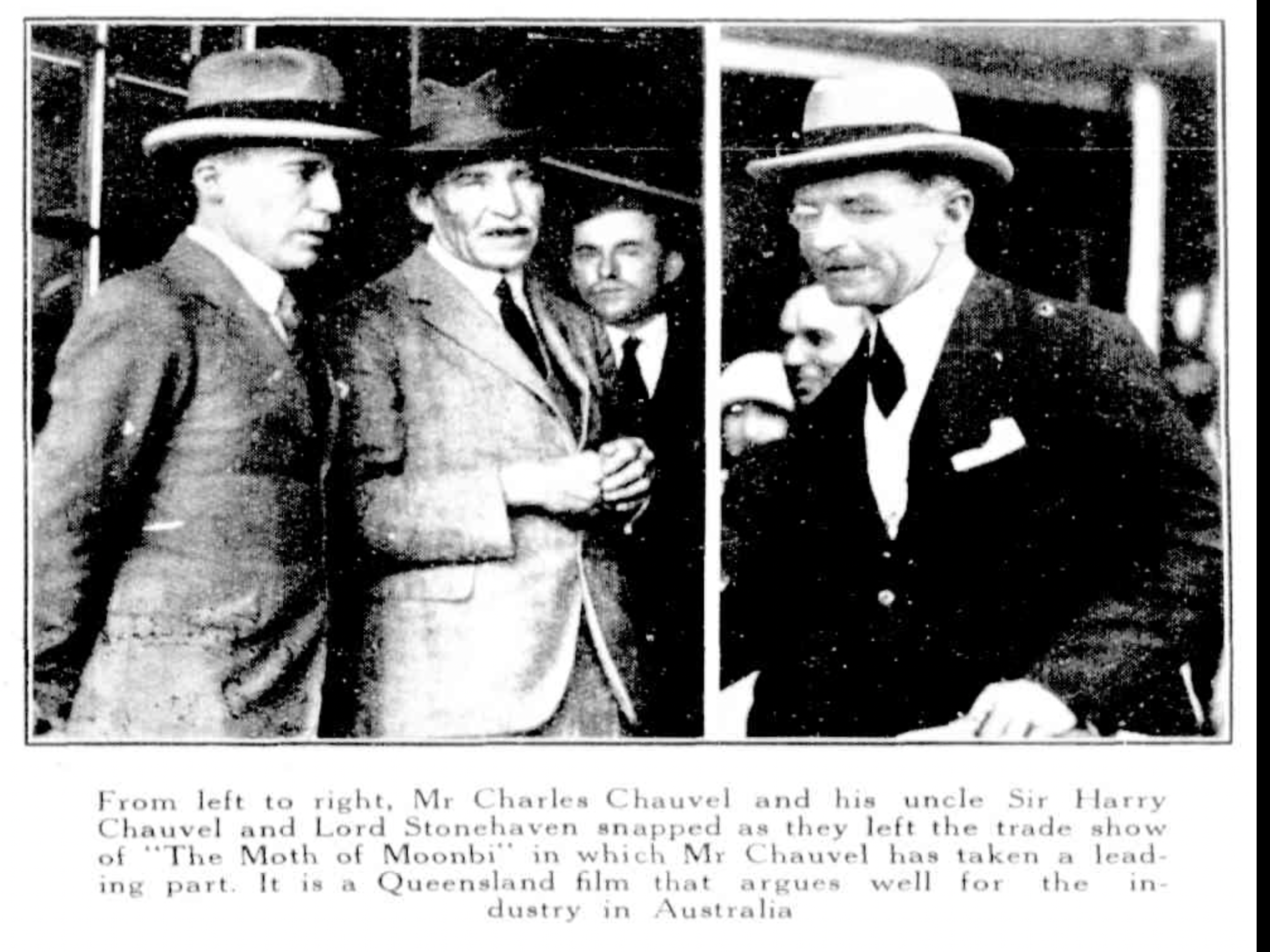 Black and white photo of Mr. Charles Chauvel and his uncle Sir Harry Chauvel and Lord Stonehaven at a trade show exit, with men in suits and hats.