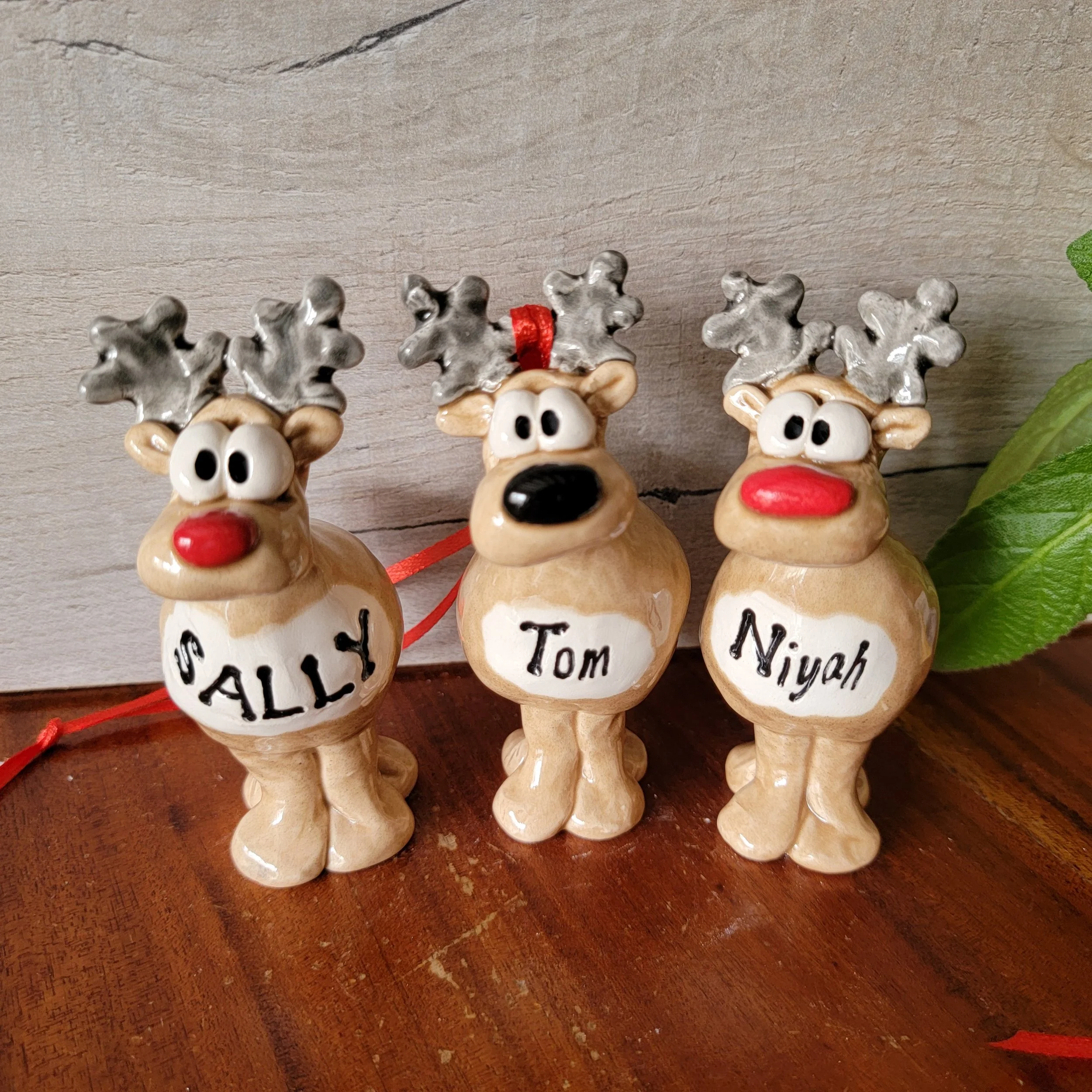 Handmade personalised Christmas decorations. Send a reindeer gift