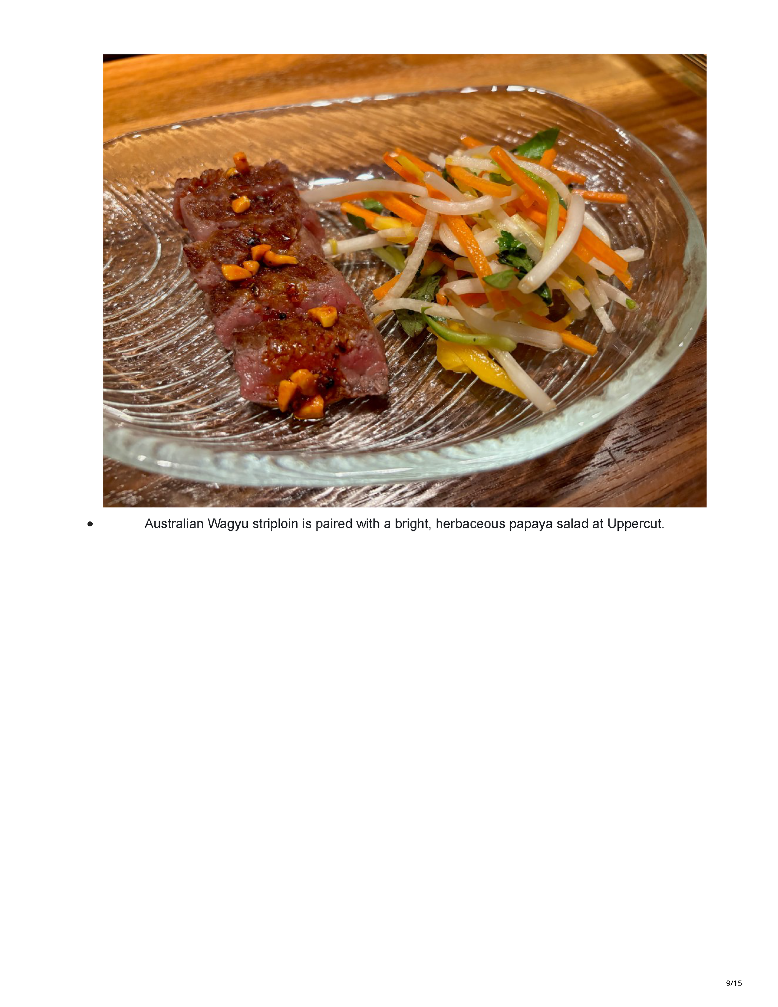 Australian Wagyu striploin served with a bright papaya salad during Uppercut’s tasting menu.