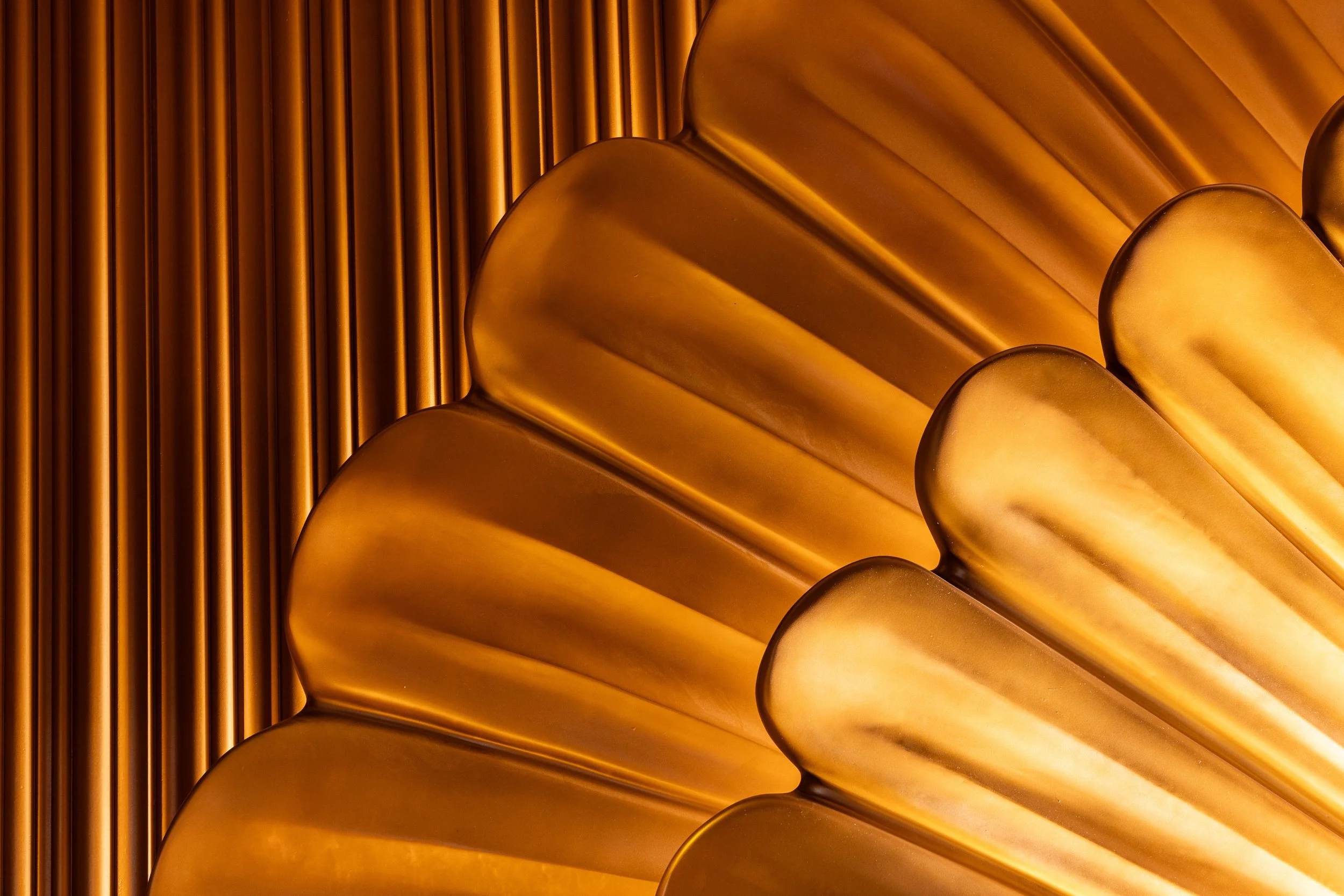 Planned detail of Clique Bar & Lounge interior at The Cosmopolitan of Las Vegas, showing the gold clamshell sculptural bar by PETERMAX Co.