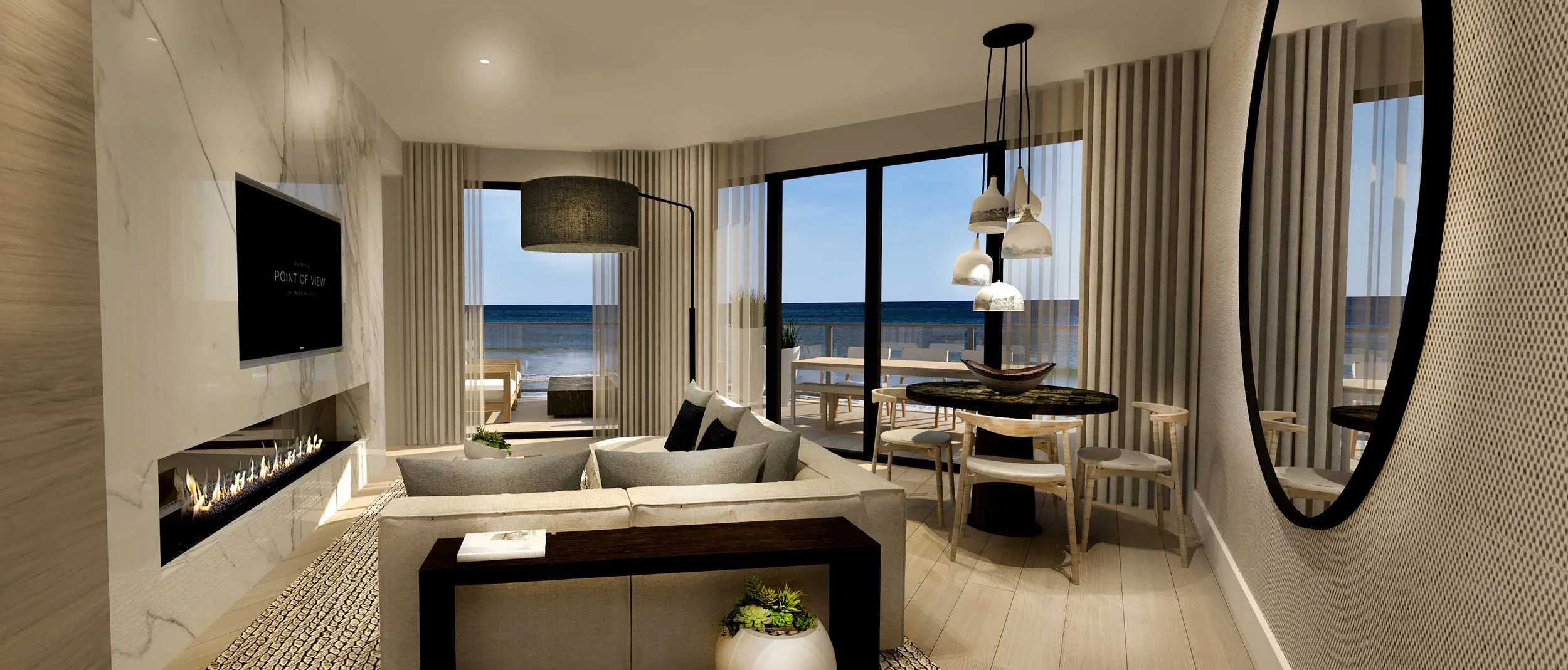 Oceanfront living area at a Point of View residence at Gurney’s Montauk, with expansive windows opening toward a private deck and Atlantic Ocean views.