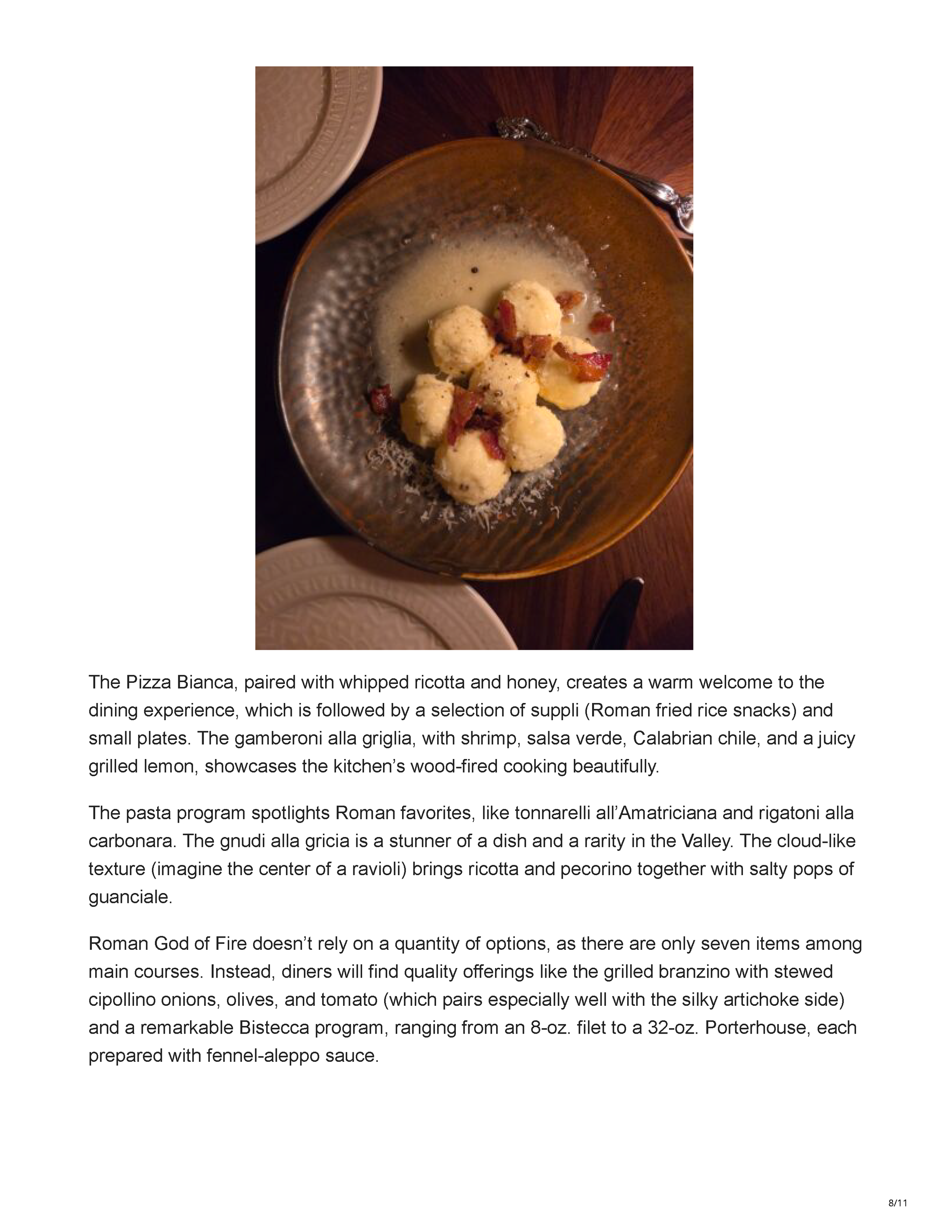 Fabulous Arizona article page announcing the opening of Roman God of Fire in Tempe, Arizona, and the restaurant’s statue-filled interior, page 8.