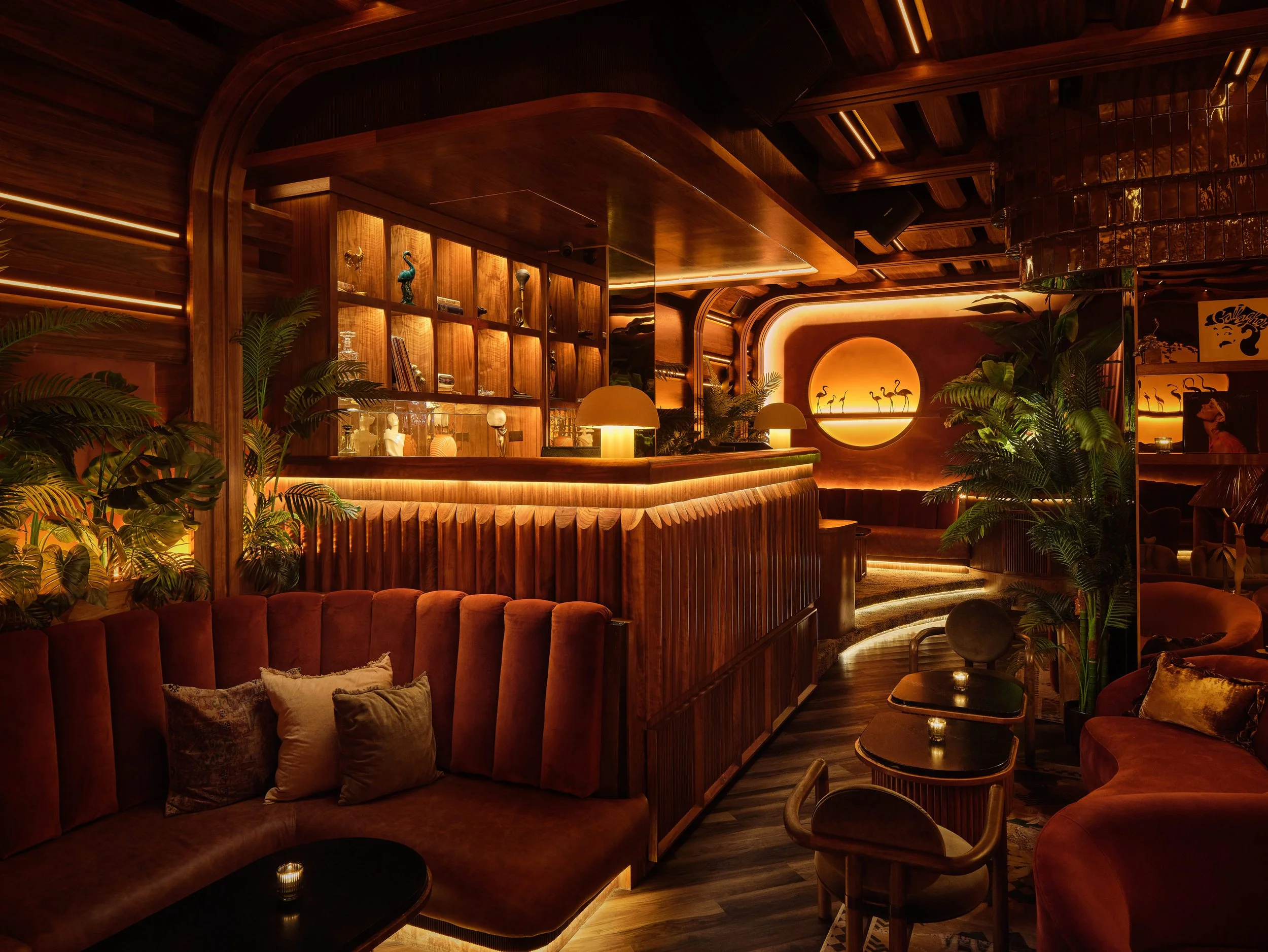DJ booth and lounge of Powder Room speakeasy in Austin, designed by Peter Maxwell Bowden of PETERMAX Co.