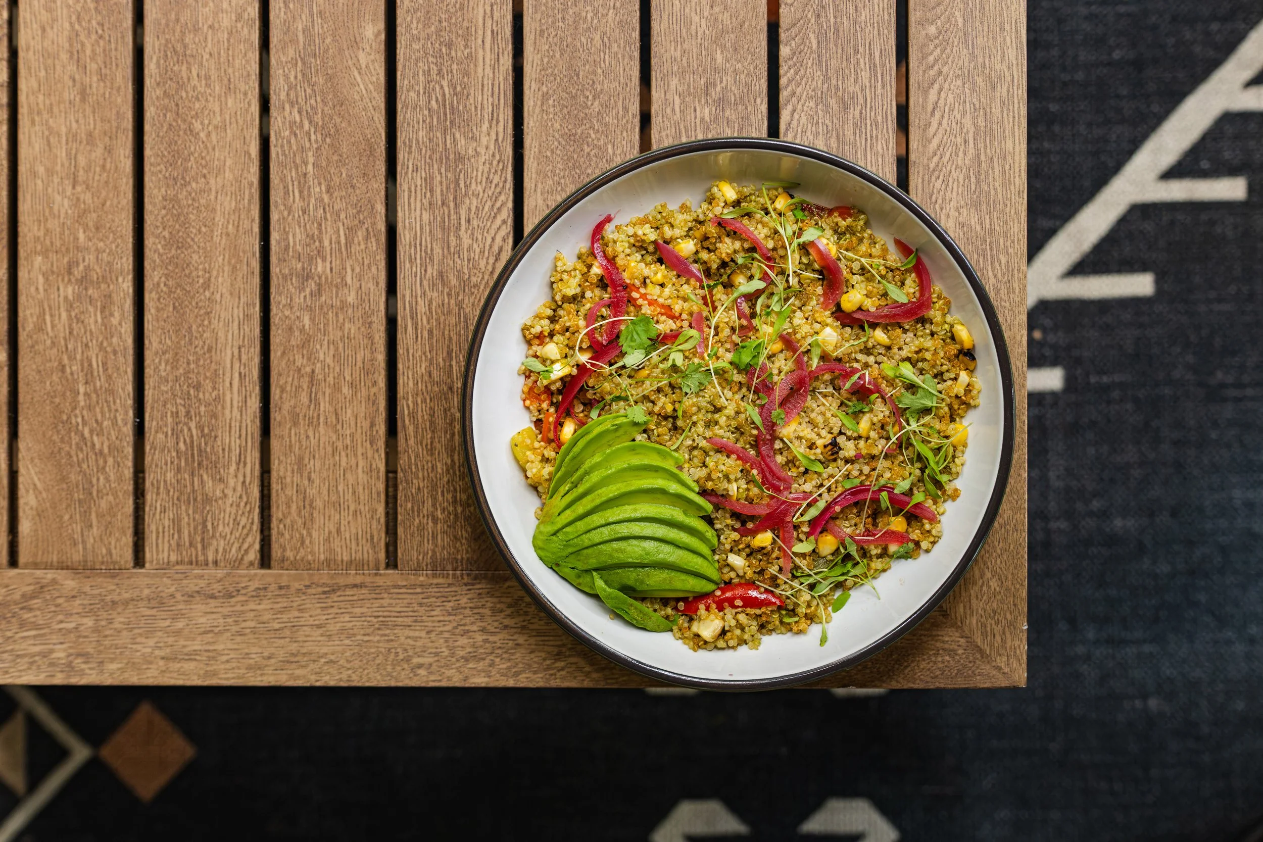 Overhead view of fresh food and healthy offerings from Manny’s menu.