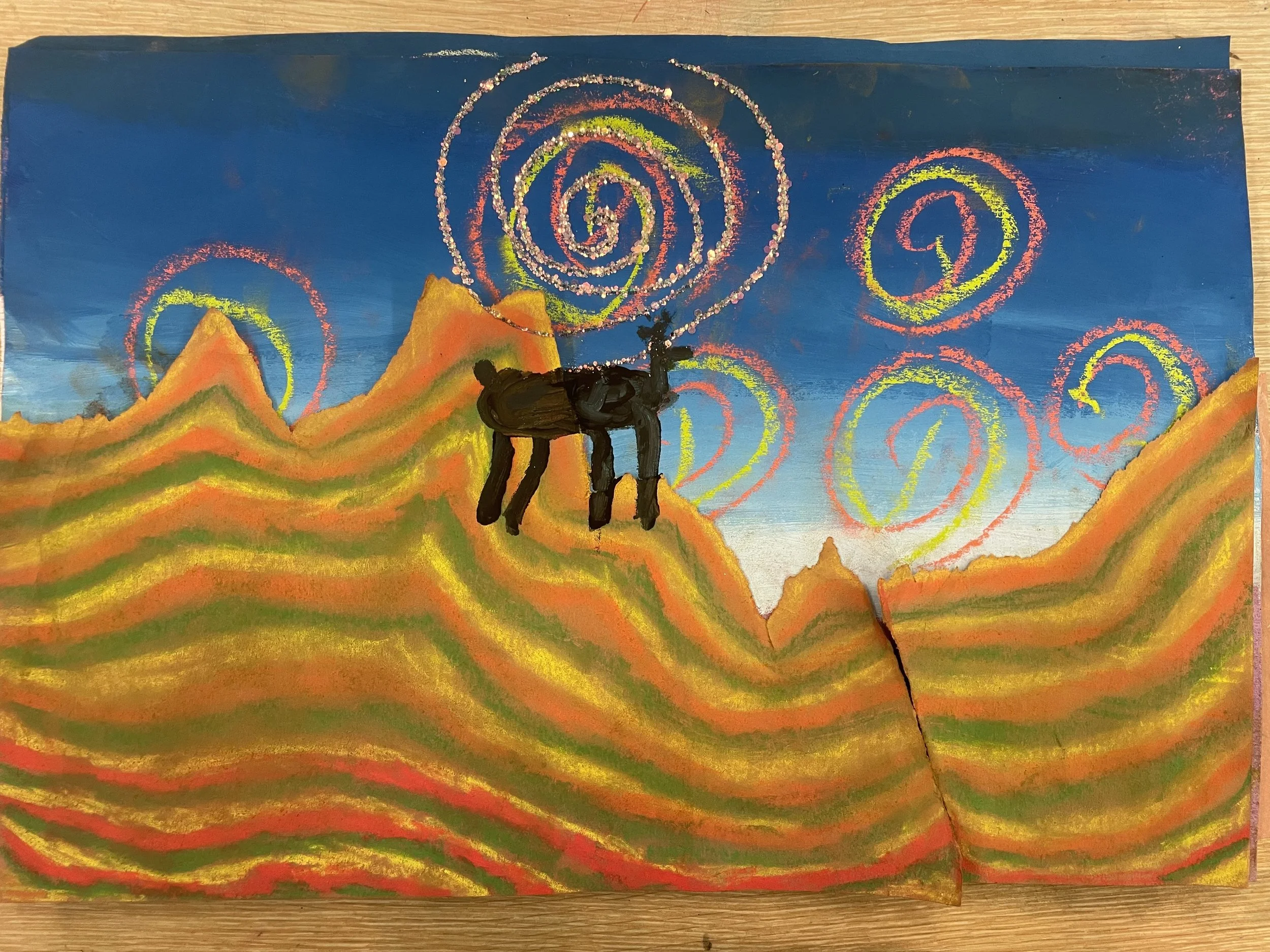 A colorful landscape painting with orange, yellow, and green wavy hills under a blue sky. Seven spiral patterns in pink, yellow, and white are in the sky. A black animal, possibly a dog, stands on one of the hills.