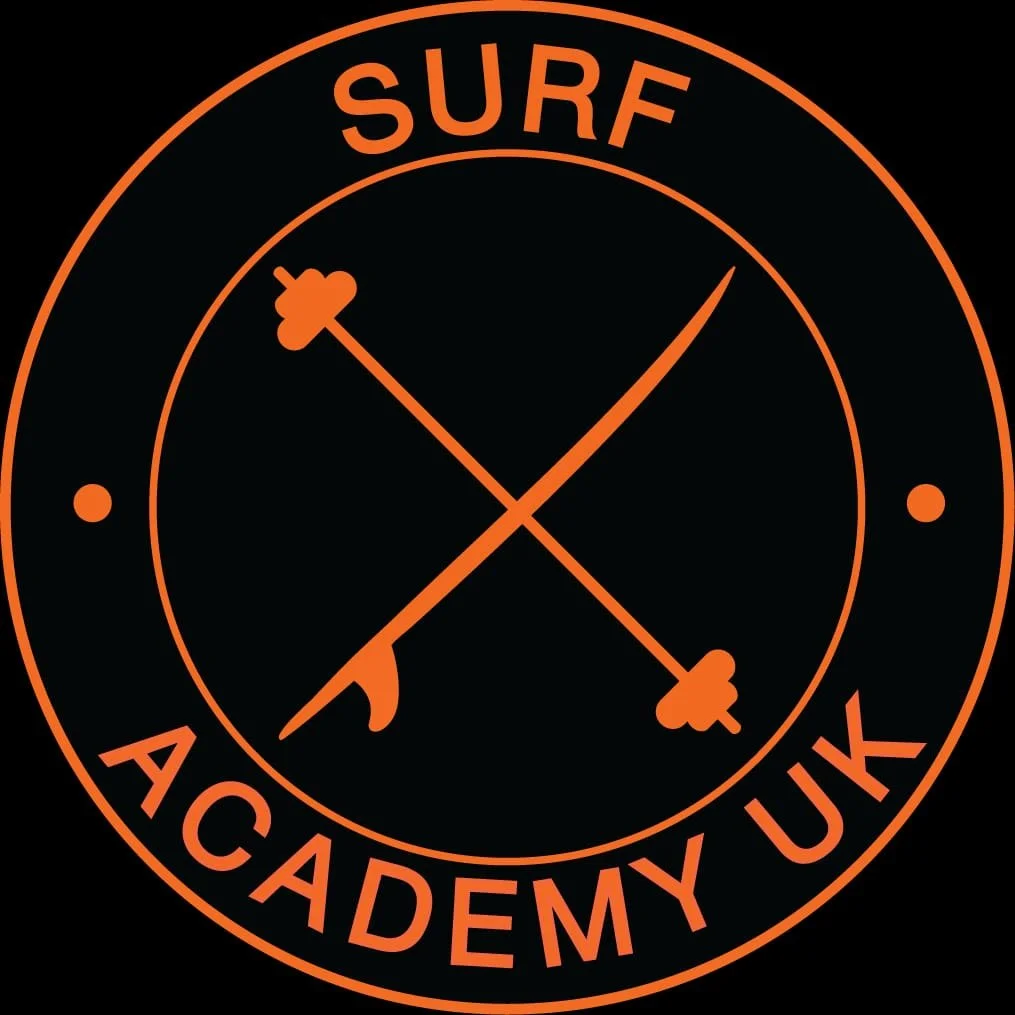 A round orange logo on black background reading Surf Academy UK.