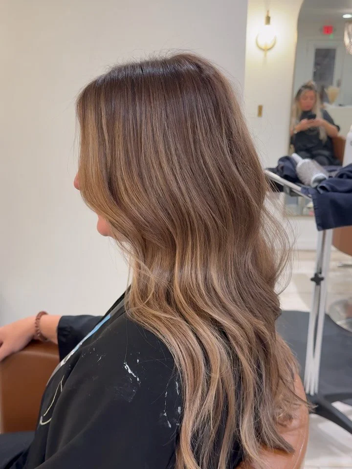 Before &rarr; after: we transitioned her from bold, brassy contrast to soft, neutral blends that flow together so naturally 🤎

You can find the link to book in my bio or text 623.252.6221 

#scottsdalehairstylist 
#azhair 
#scottsdalehair 
#hairstyl