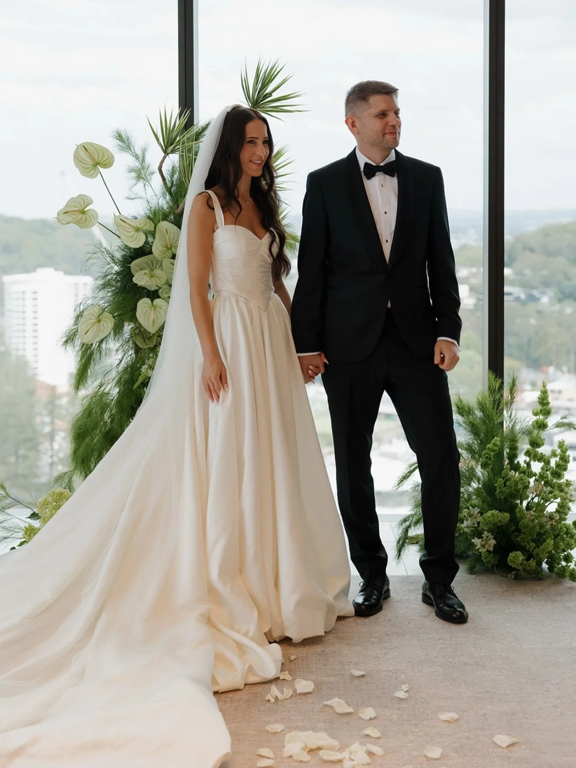 Dynamite duo Linda and Gatis setting the stage for the Mondrian Penthouse&rsquo;s first-ever wedding. The undulating, textural green altar flowers created a fresh atmosphere that brought the outdoors into this stunning space that we look forward to r