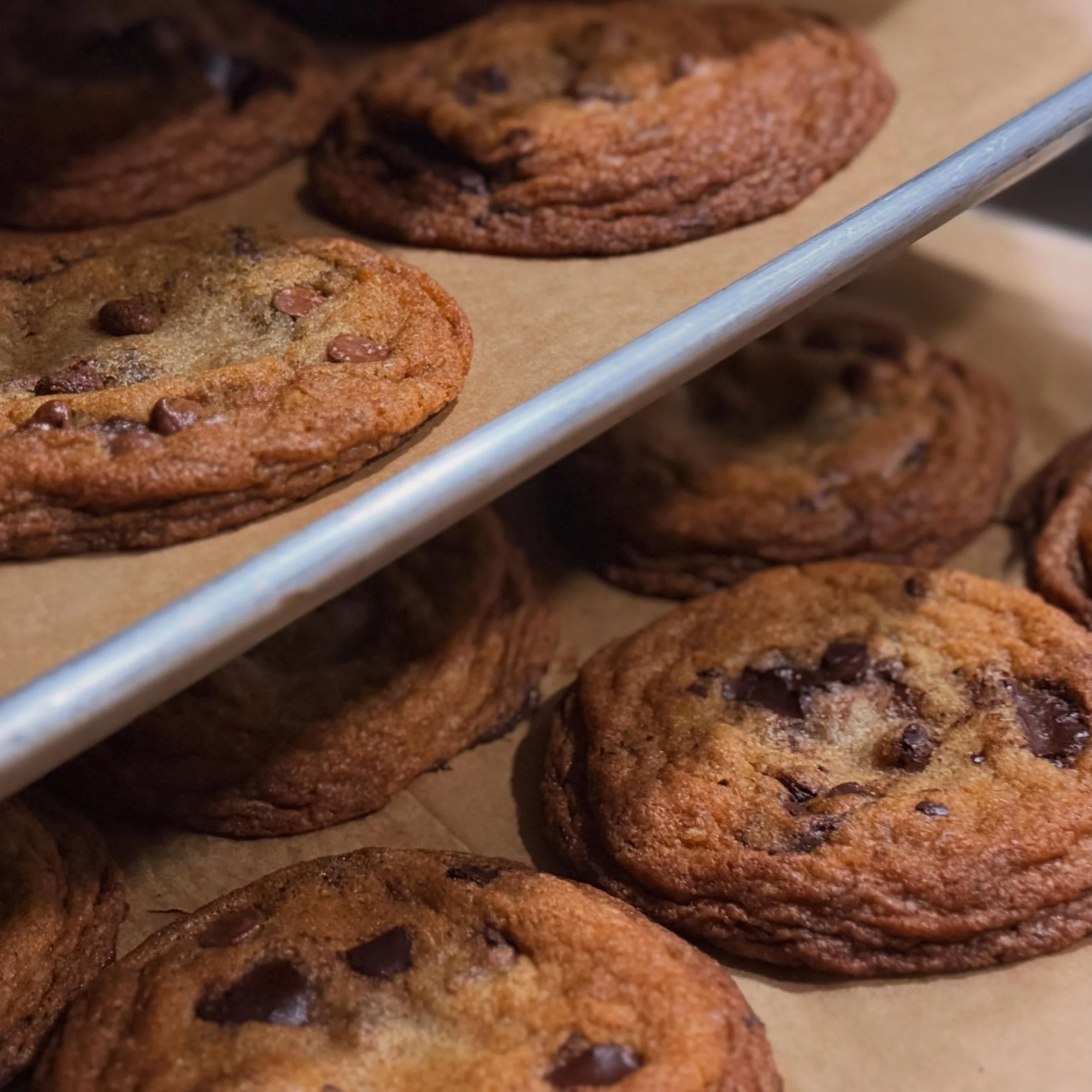 did someone say national chocolate chip day? 🍪
fine&hellip; we&rsquo;ll join the trend. even though our OG cookie has never seen a single chocolate chip 😮

every cookie is loaded with hand-chopped bittersweet + milk chocolate chunks instead. crisp 