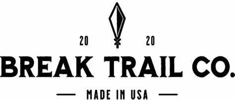 Black and white logo for Break Trail Co., featuring a diamond-shaped mountain peak icon above the company name, with the year 2020 on each side and the text 'Made in USA' below.