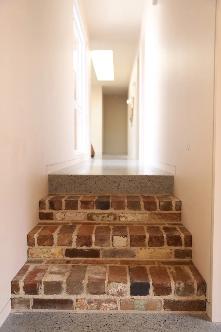 hallwaybrickstairs.jpeg