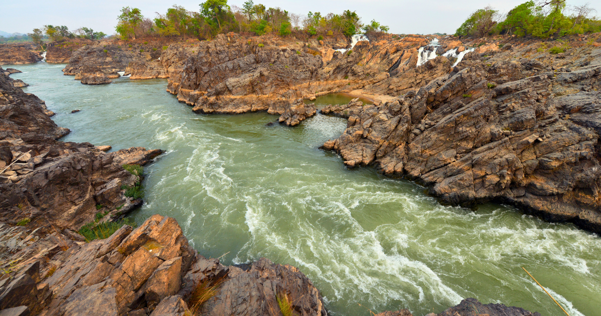The Mekong River splitting over rock shelves at Li Phi Falls on Don Khon