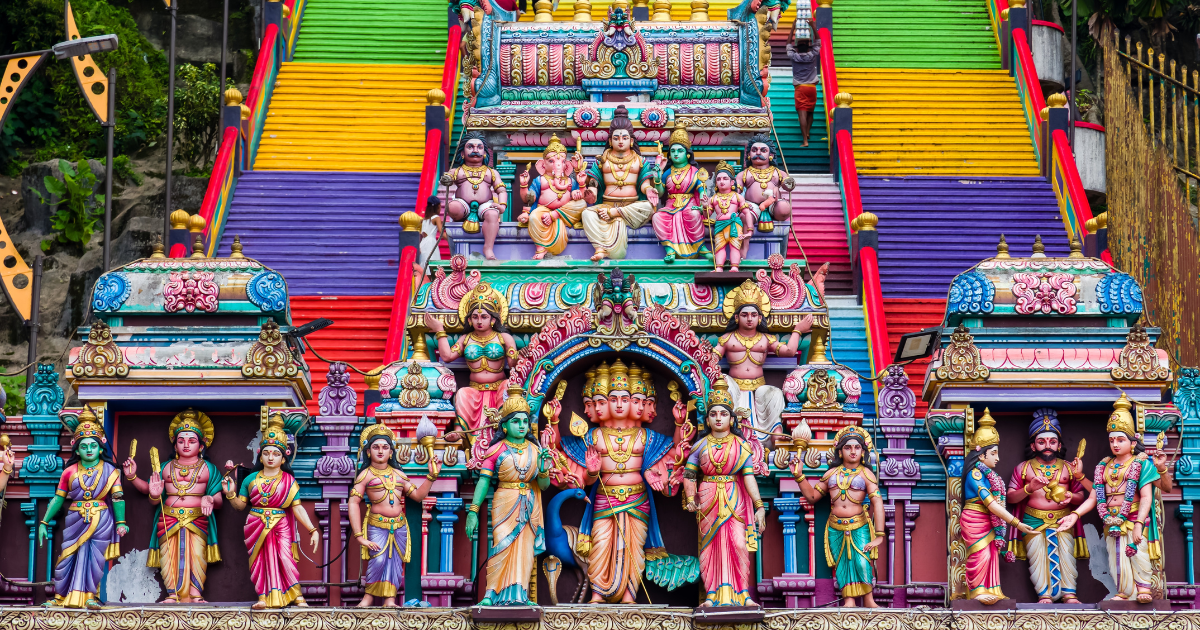 The colourful Hindu temple entrance and rainbow staircase at Batu Caves near Kuala Lumpur