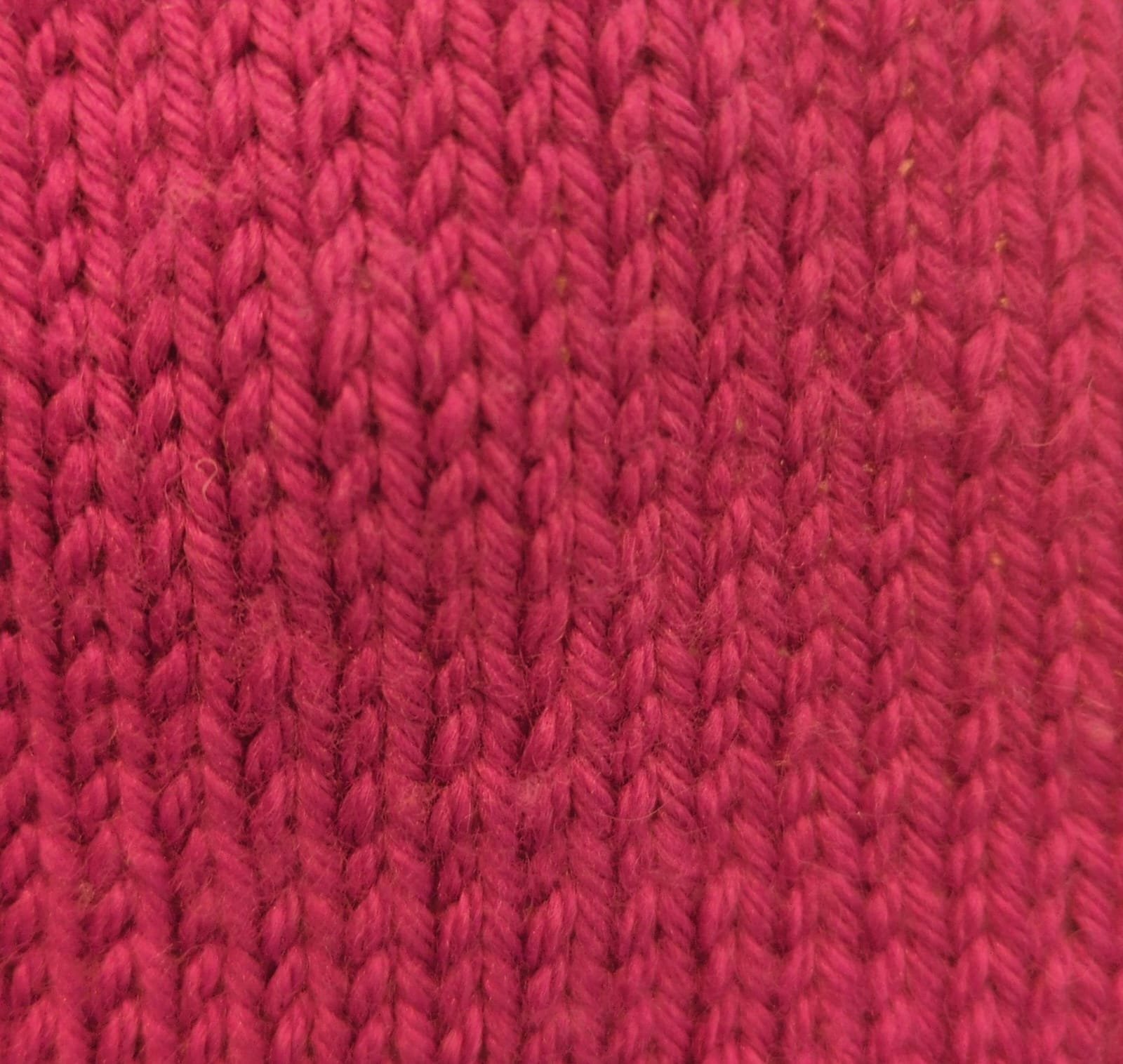 Knitted Stitches in Pink Yarn