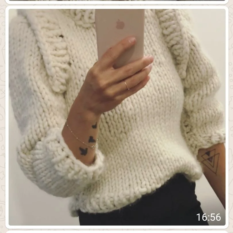 Chunky Cream Knitted Sweater on a White Woman