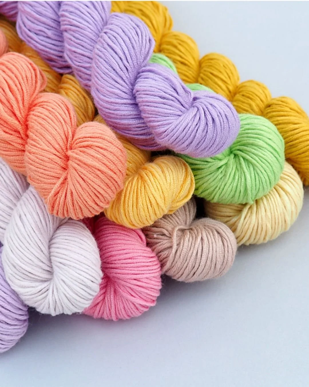 A collection of different coloured bamboo yarn skeins
