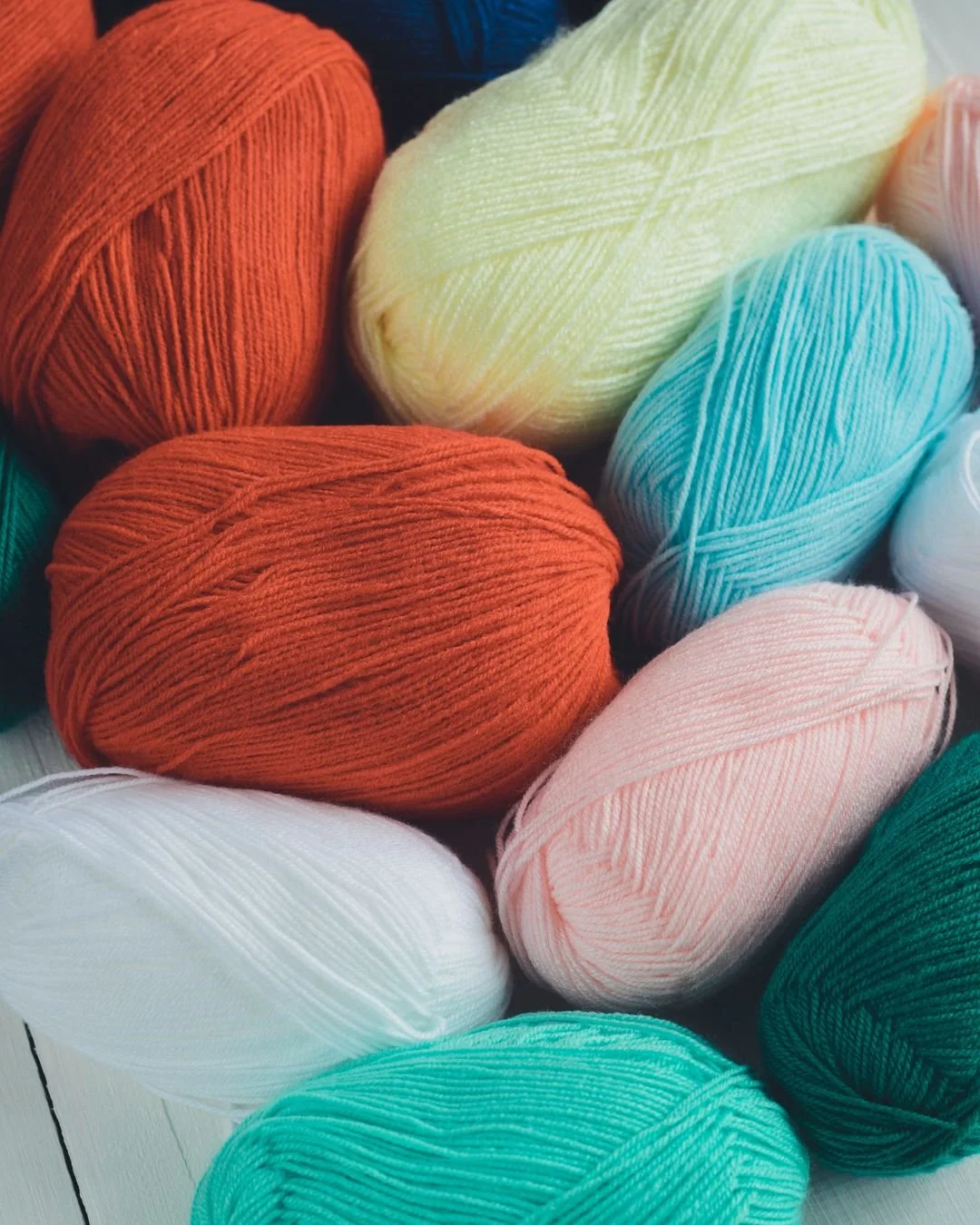 A collection of acrylic yarn balls