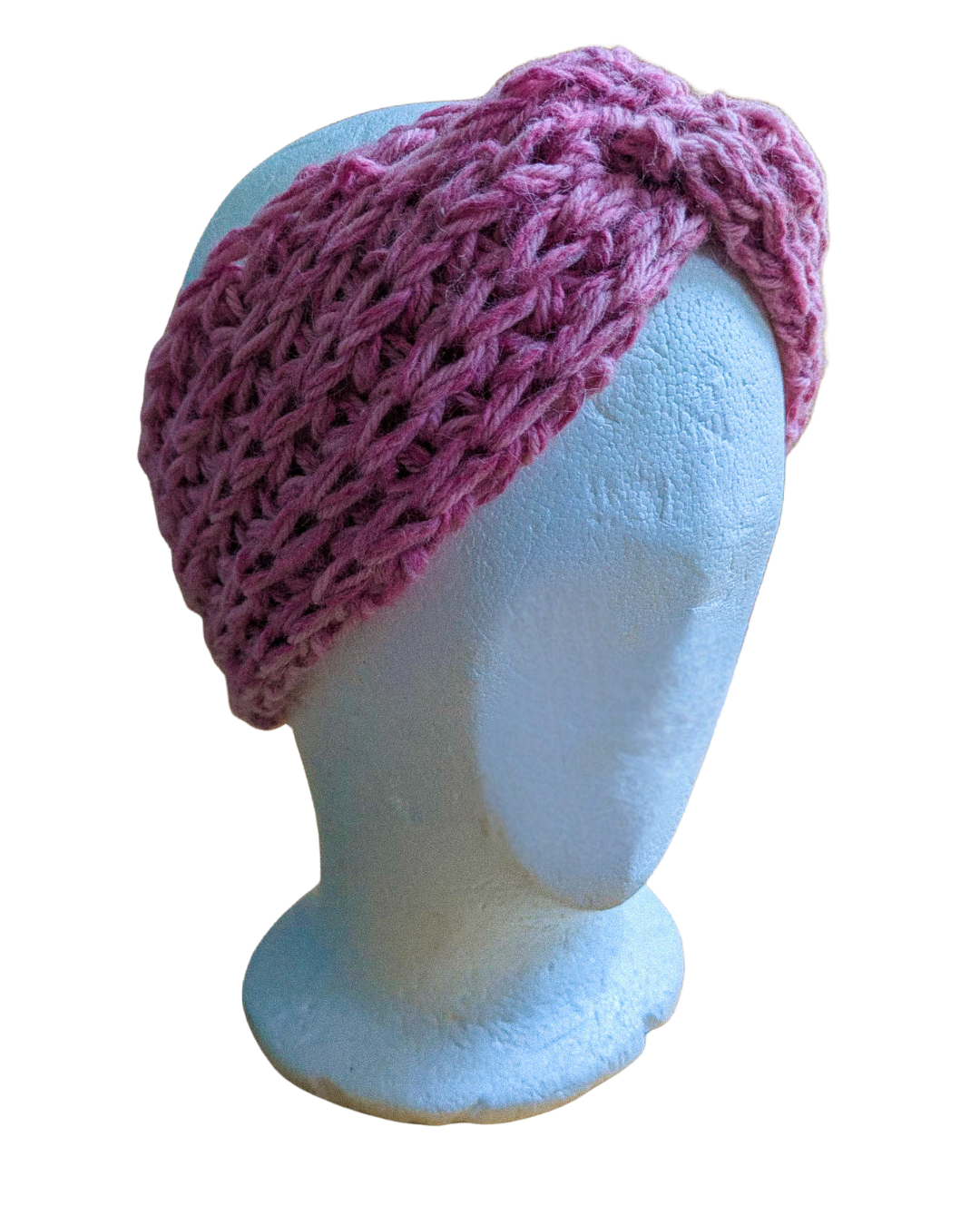 Light pink, chunky knitted headband on a white mannequin head