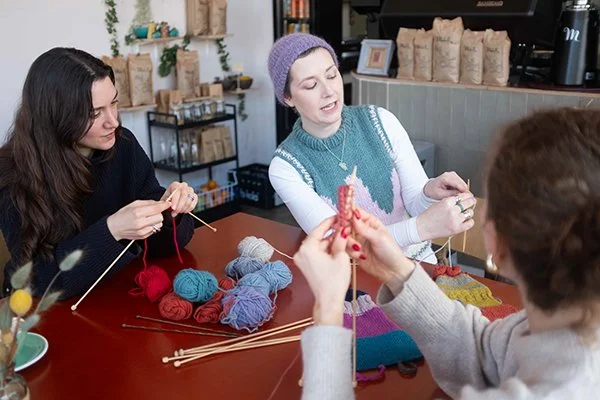 Knitting Teacher Alice teaching a beginner knitting group class
