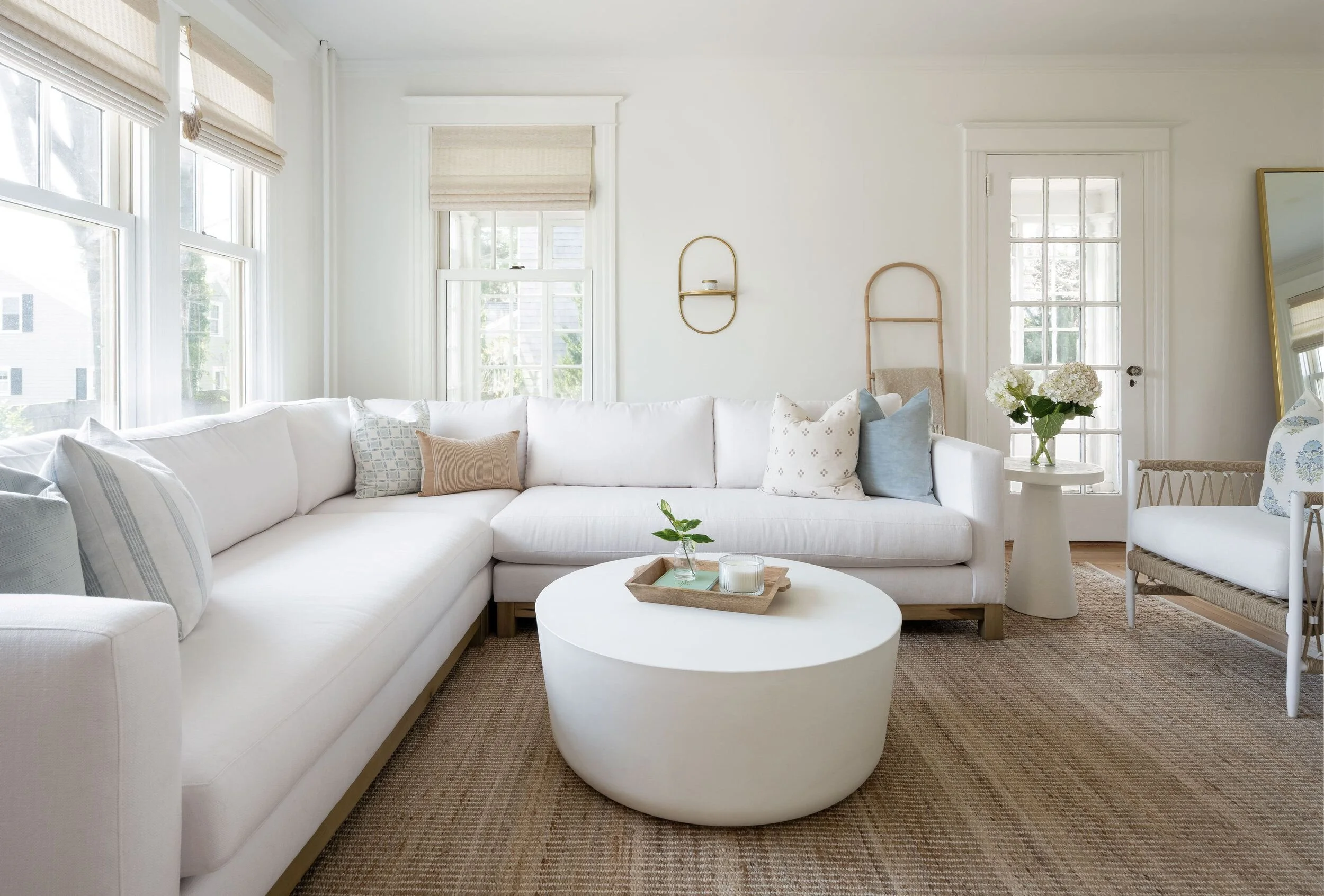 While still popular in some spaces, sterile all-white rooms are being swapped out for warmer, more layered palettes. White is now being used more as a backdrop than the main attraction.