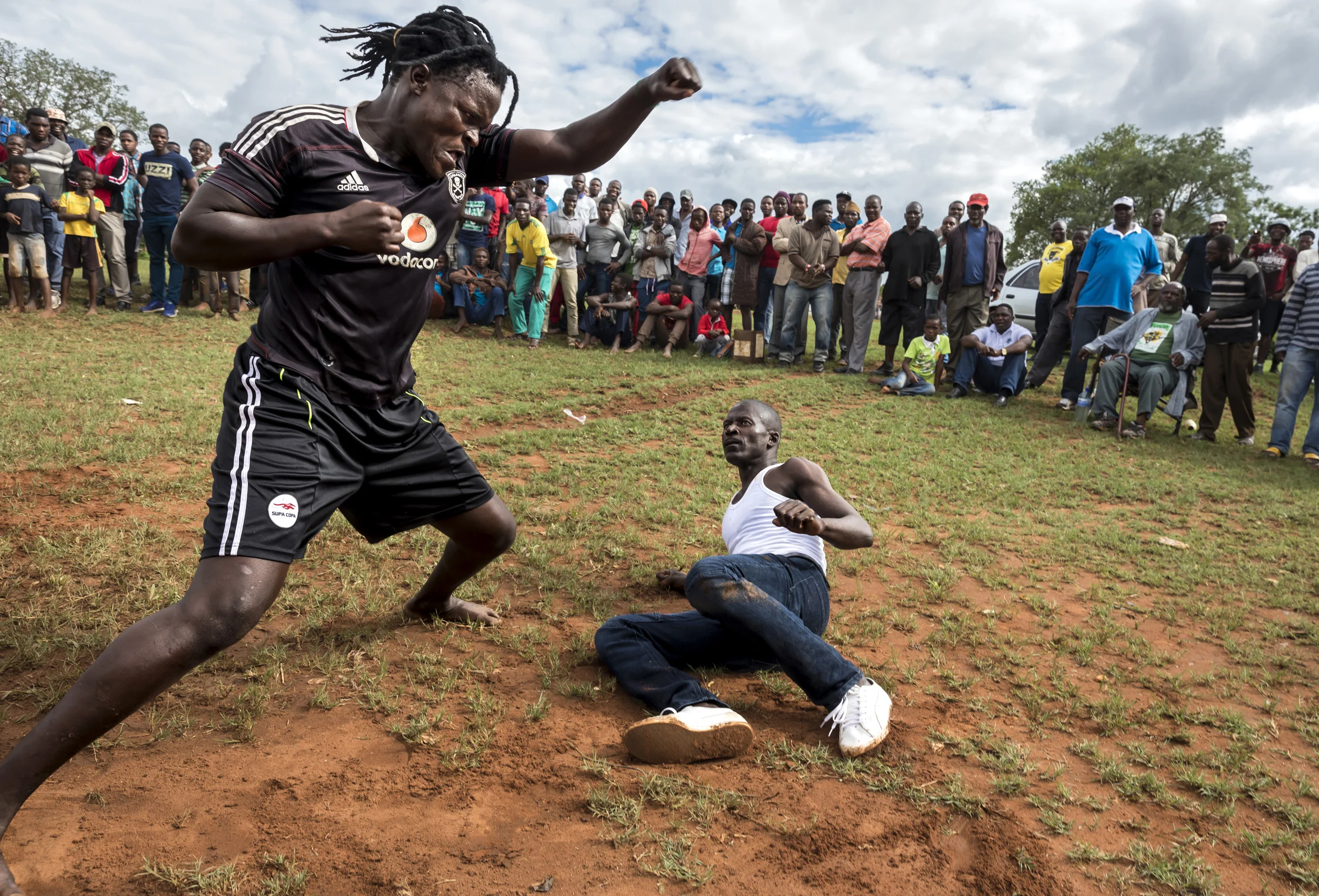 TSHIFIDI, VENDA, SOUTH AFRICA, 15 DECEMBER 2016: Men and boys of the Venda tribe challenge each other and fight bare knuckle over the festive period in South Africa. This is a tradition that dates back 200 years and began when herd boys tried to get