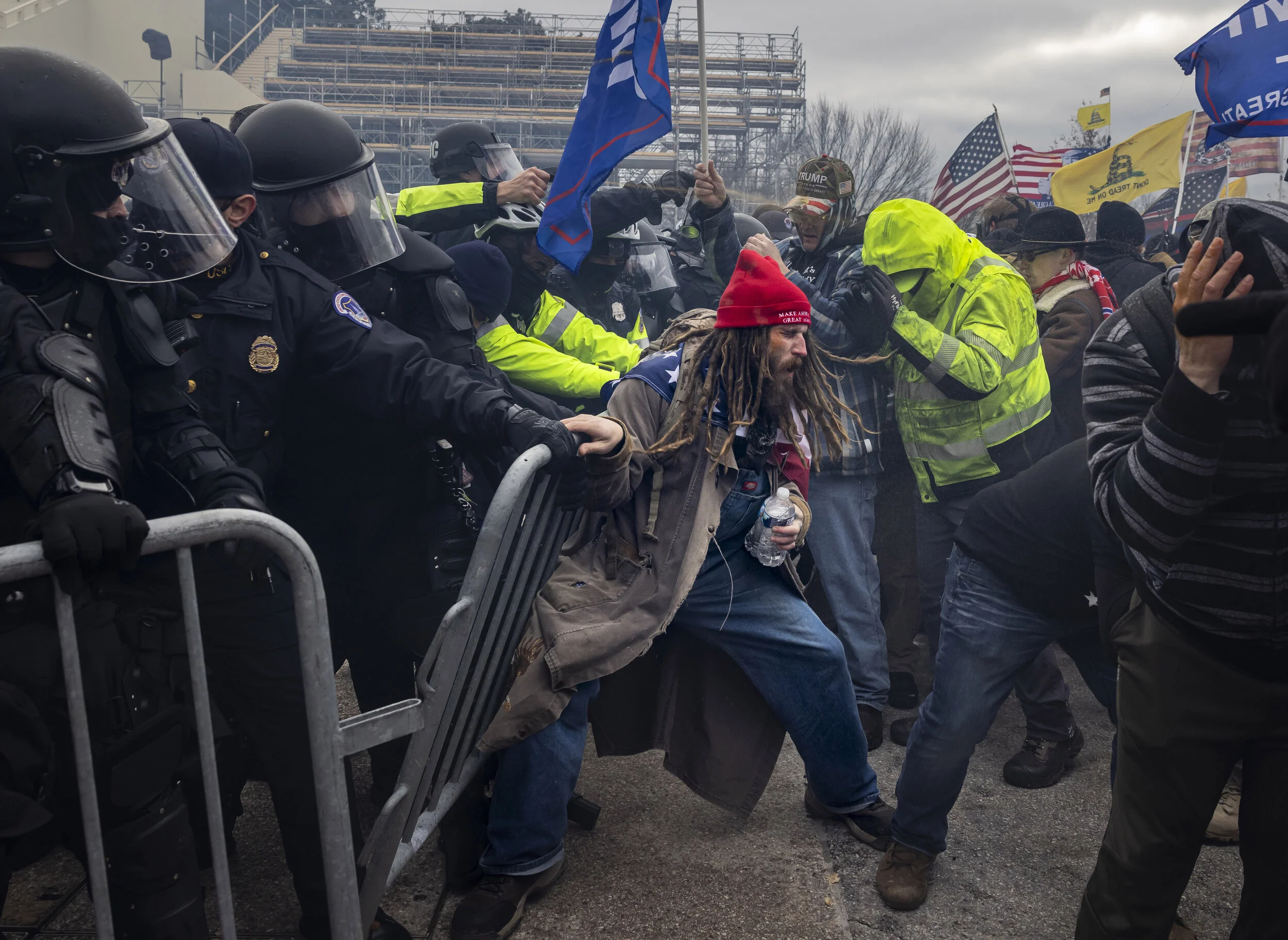 WASHINGTON D.C., USA - JANUARY 6: Trump supporters clash with police and security forces as people try to storm the US Capitol in Washington D.C on January 6, 2021. Demonstrators breeched security and entered the Capitol as Congress debated the 2020