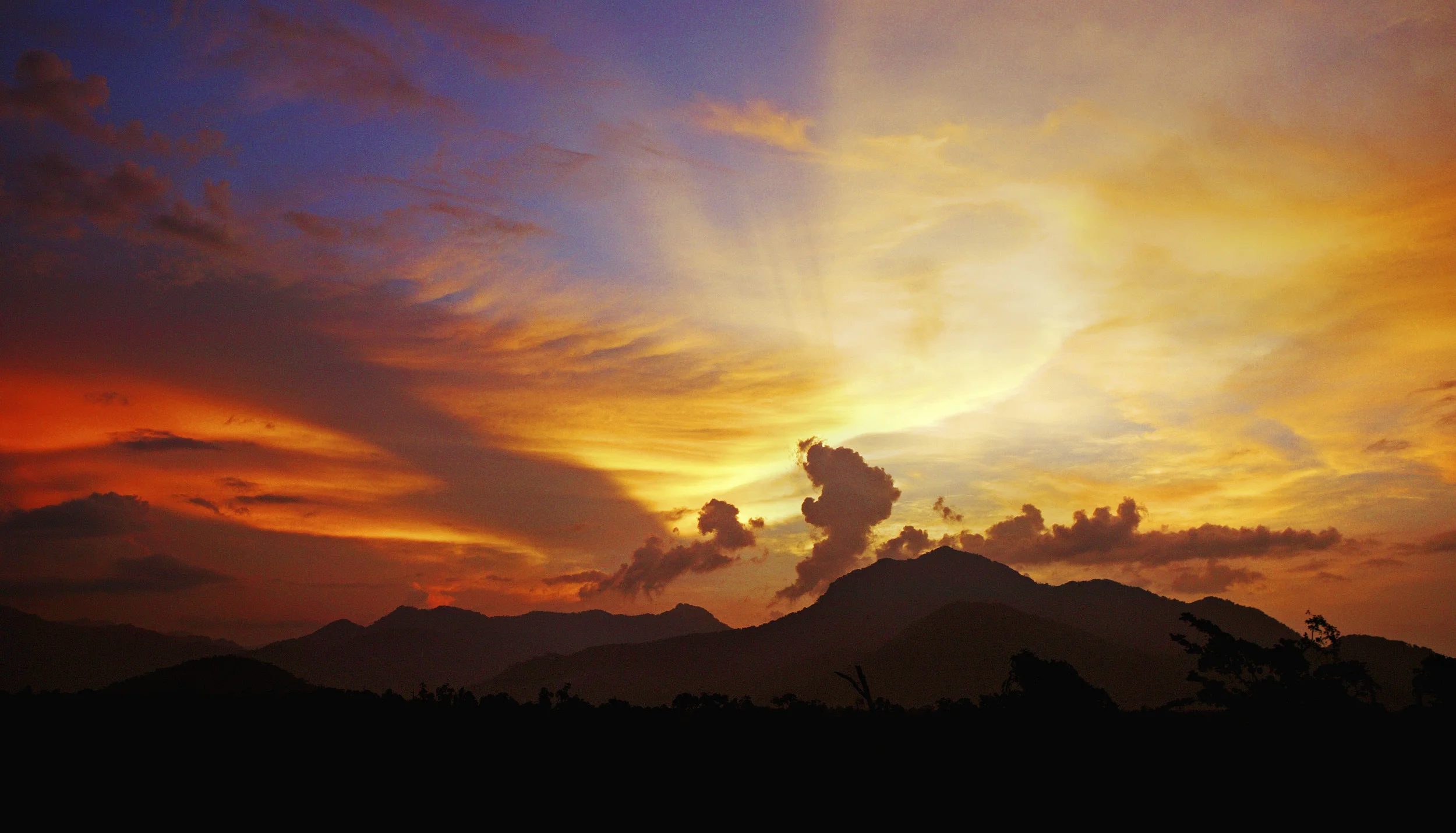 SEPIK RIVER REGION, PAPUA NEW GUINEA, AUGUST 2006: A Sunset image from the the Sepik River, a remote region of Papua New Guinea where life-style is still derived almost entirely from man's relationship to the natural world, 20 August 2006. (Photo b