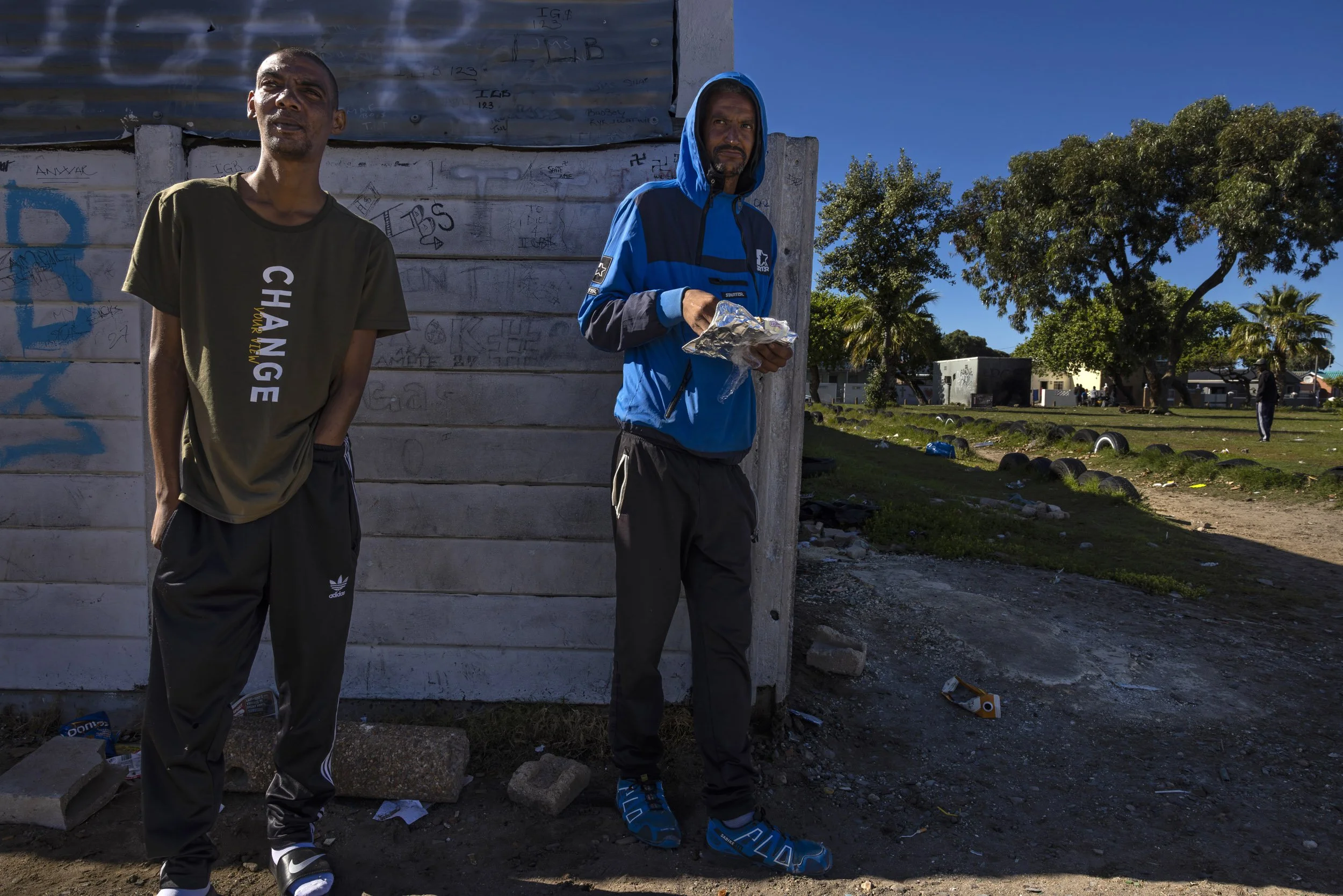 MITCHELL'S PLAIN, CAPE TOWN, SOUTH AFRICA: Members of the Dirty Bastards gang sell drugs in a park in a part of Mitchell's Plain known for gang activity and drugs. Gangs on the Cape Flats have long been a feature of the coloured community. They are