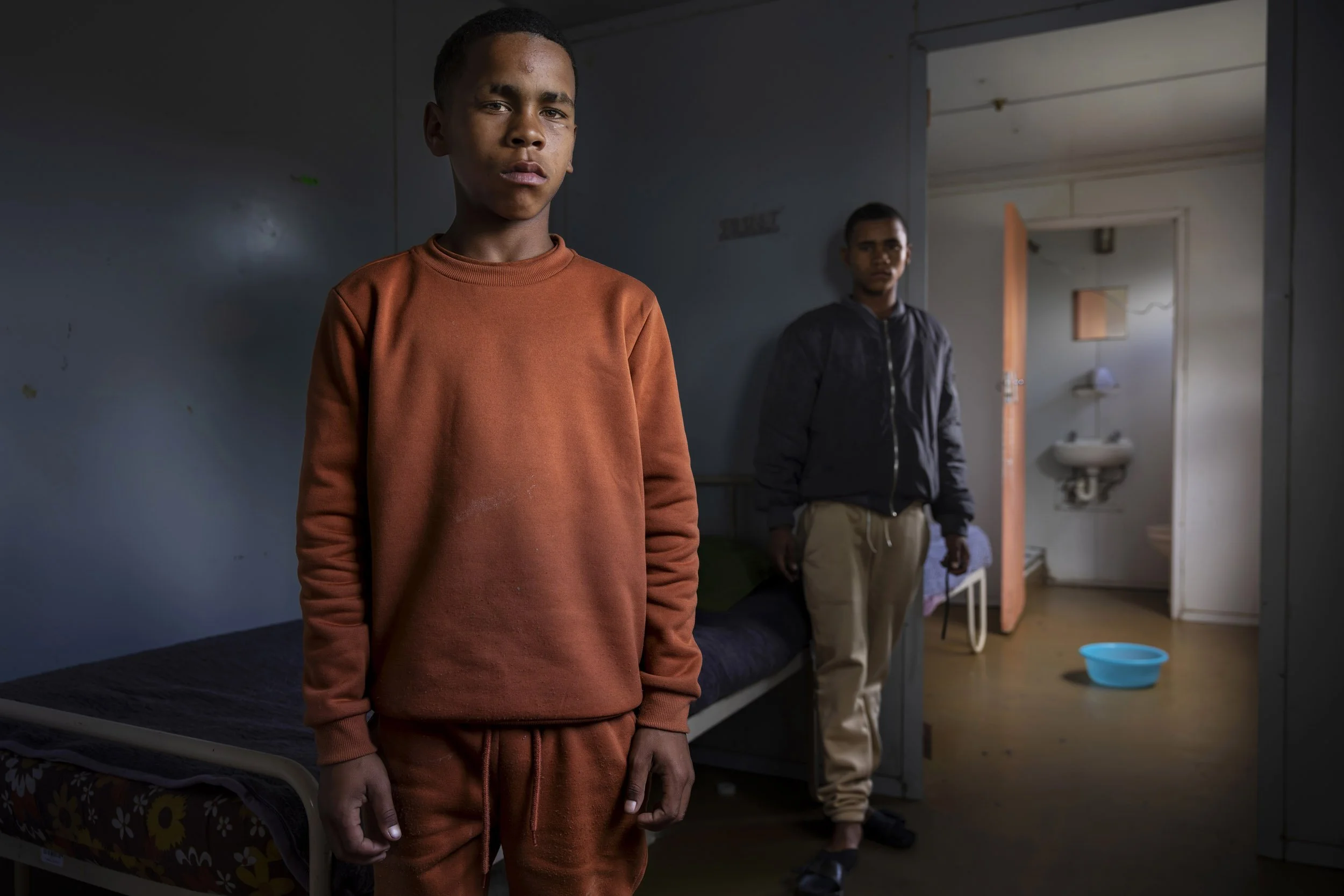 STRANDFONTEIN, CAPE TOWN, SOUTH AFRICA: Ashtivon and Tyrees Jansen, 15 and 13, come from very poor circumstances. Their mother, a long time drug user, had 5 kids and told them to go live with their grandmother in gang-heavy Hanover Park when they we