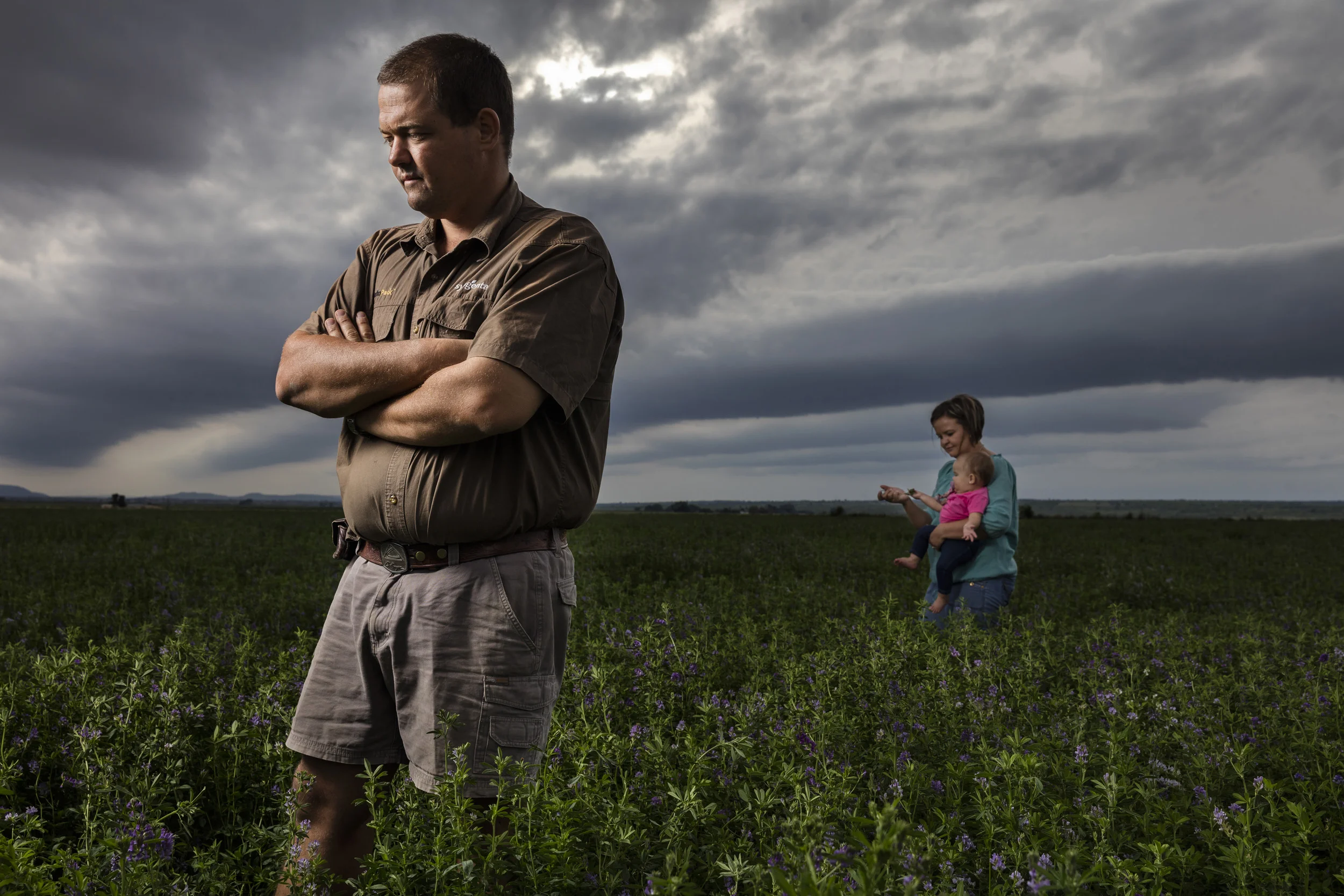 MARBLE HALL, SOUTH AFRICA, 18 NOVEMBER 2016: Diederich Beyers and his wife Dolla and one of their three childen are seen in one of their fields on their farm in Marble Hall, South Africa. Beyers is seen one week after his farm home was invaded by 6
