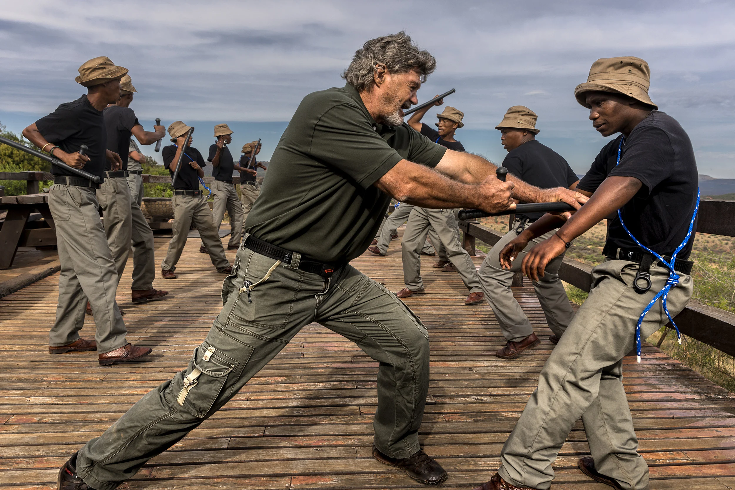 SWARTRUGGENS, SOUTH AFRICA: A group of Bushmen security personel learn self defense tactics to combat farm attacks on a farm in Swartruggens. They are taught by Dap Maritz, a long time security consultant on farm security and rhino protection. The E