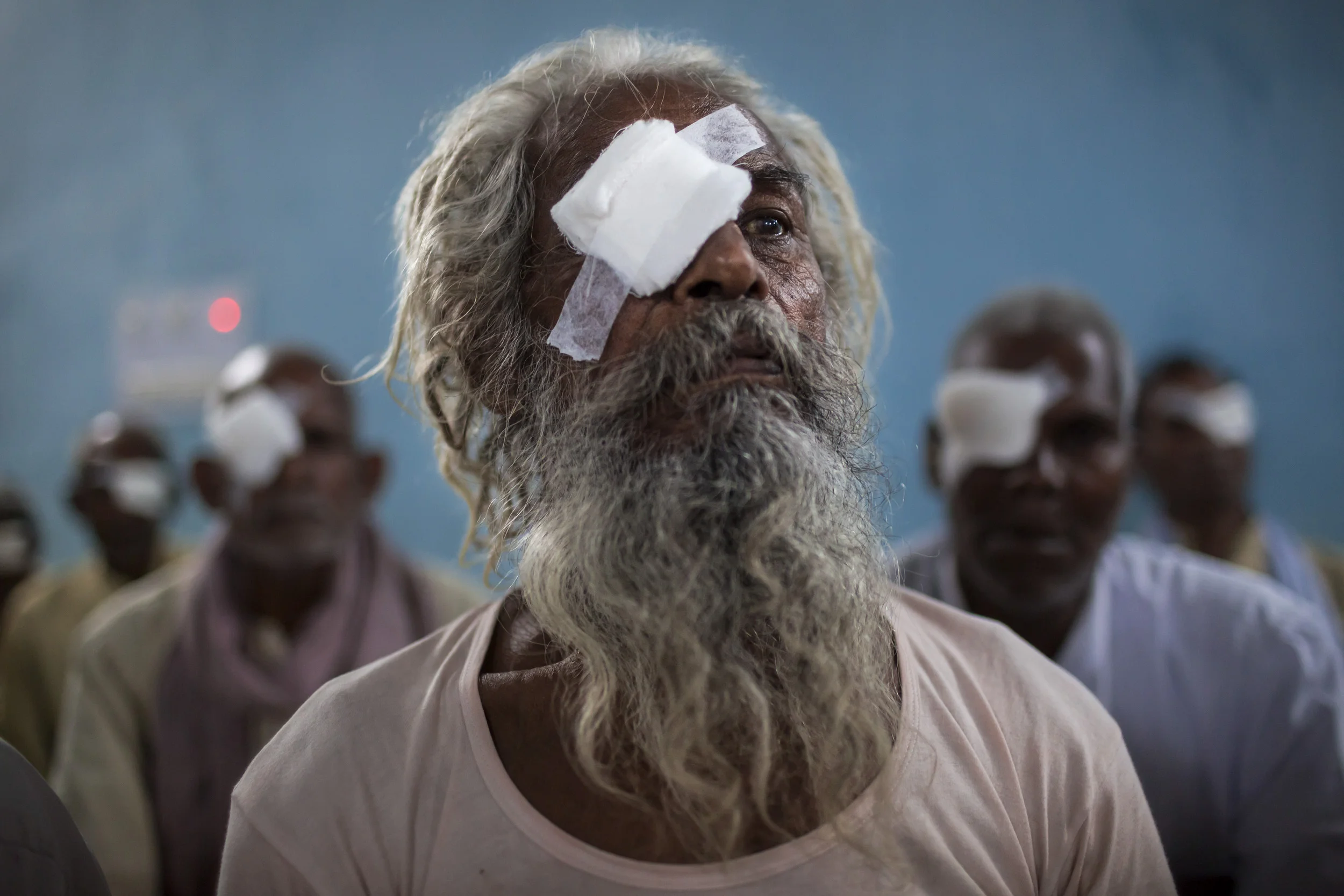 AKHAND JYOTI EYE HOSPITAL, PATNA, BIHAR, INDIA, 10 SEPTEMBER 2014: Eye surgery patients recover in a mass ward at Akhand Jyoti Eye Hospital, the third largest eye hospital in India. This hospital performed over 65 000 eye surgeries last year, often