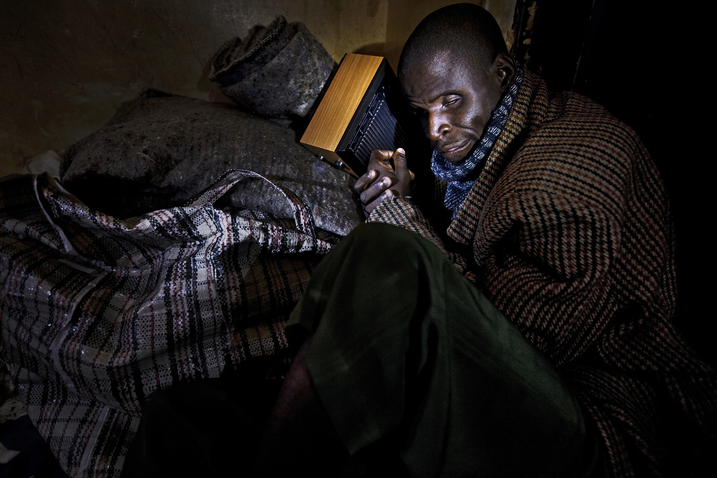 JOHANNESBURG, SOUTH AFRICA, JUNE 2009: A blind Zimbabwean refugee photographed in slum dwellings in inner city Johannesburg, South Africa. Most of the blind are in South Africa illegally and lack official papers and ID documents which might help t