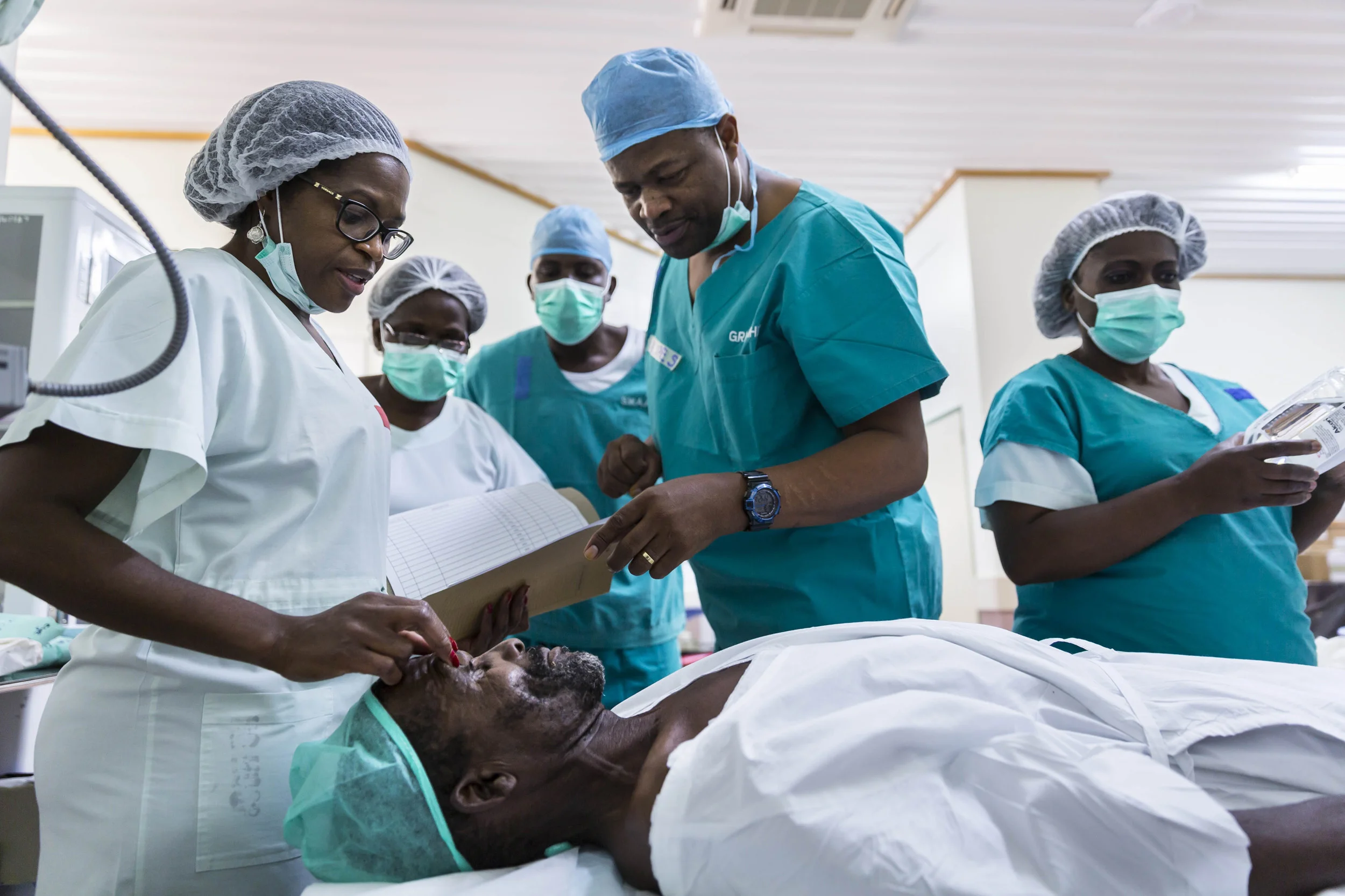 OMARURU, NAMIBIA, 2 November 2015: Dr Helena Ndume, winner of the Mandela prize and Namibia's most celebrated opthmalogist, performs cataract surgery on patients attending a blindness clinic in Omaruru, Namibia. Most of these people will recover a d