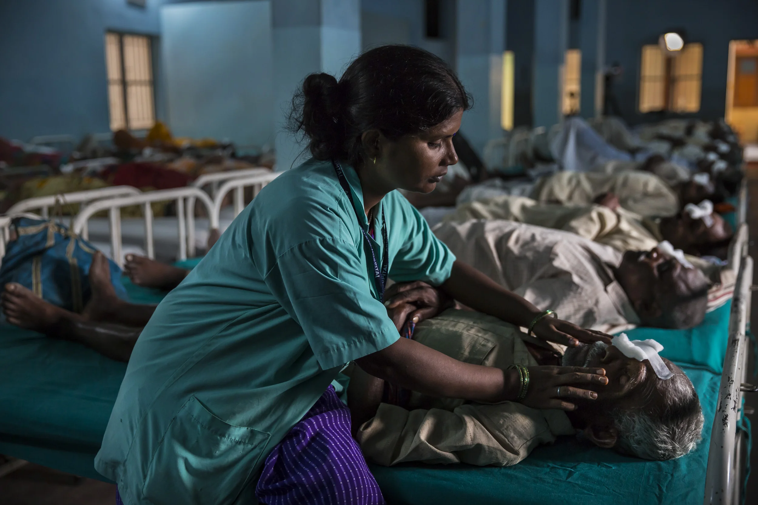 AKHAND JYOTI EYE HOSPITAL, PATNA, BIHAR, INDIA, 10 SEPTEMBER 2014: Eye surgery patients recover in a mass ward at Akhand Jyoti Eye Hospital, the third largest eye hospital in India. This hospital performed over 65 000 eye surgeries last year, often