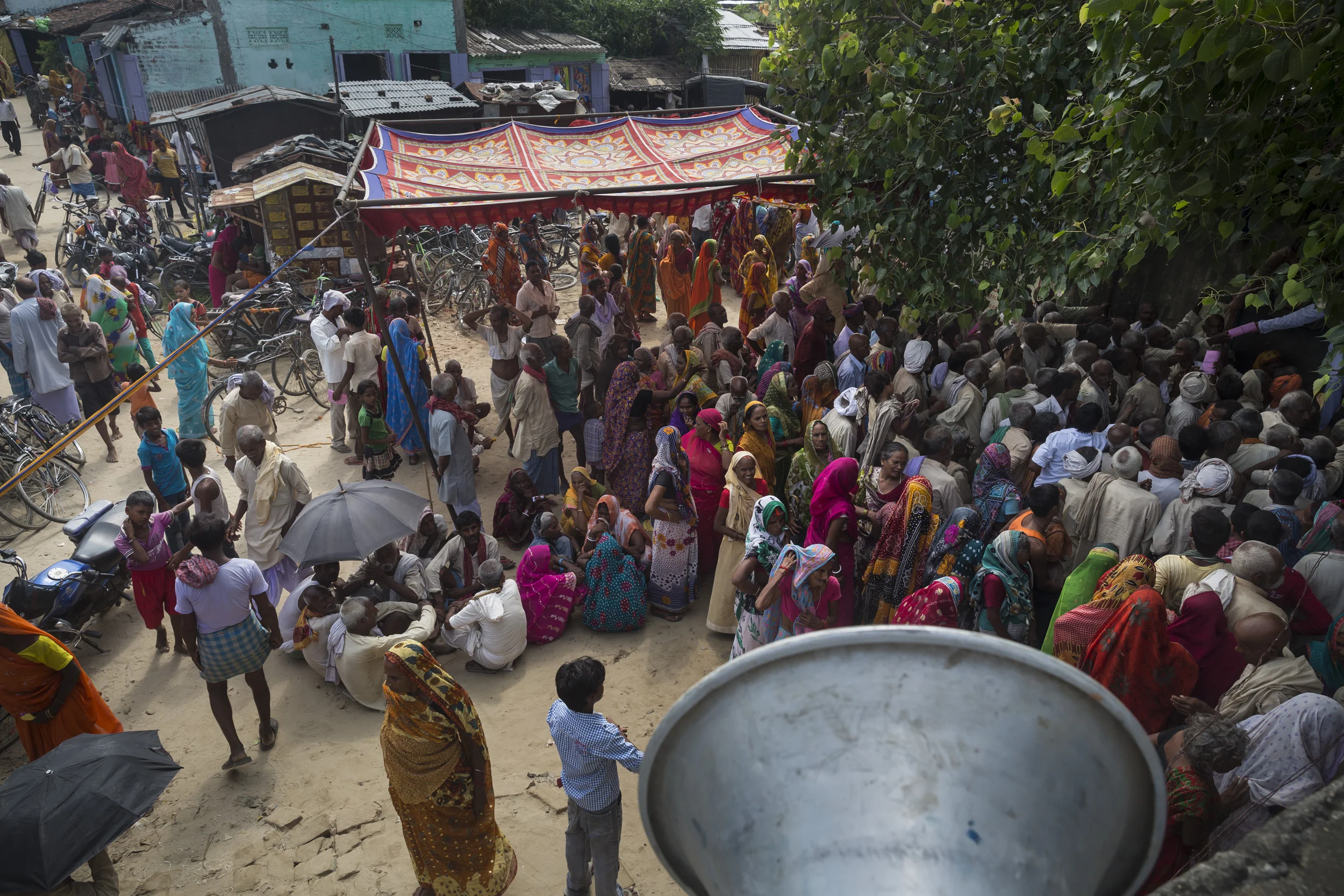 PATNA, INDIA, 10 SEPTEMBER 2014: Blind Indian boy Dablu Kuma, 8, and his mother make their way to and from a blindess camp on a remote river island where he is diagnosed with Cataracts and sent to hospital for surgery. (Photo by Brent Stirton/Report