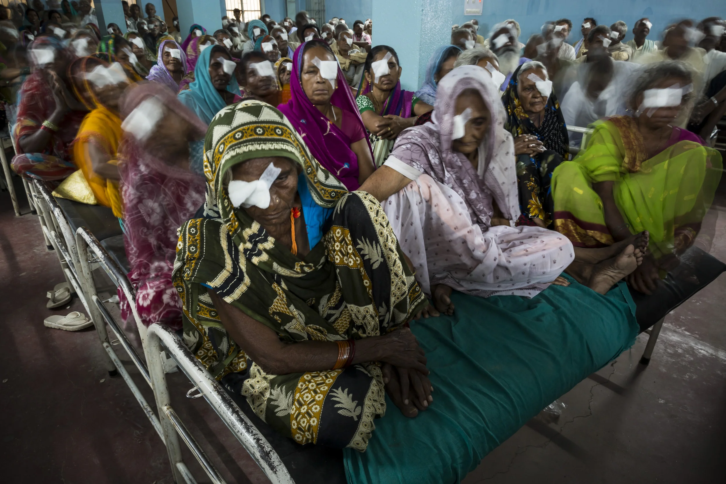 AKHAND JYOTI EYE HOSPITAL, PATNA, BIHAR, INDIA, 10 SEPTEMBER 2014: Eye surgery patients recover in a mass ward at Akhand Jyoti Eye Hospital, the third largest eye hospital in India. This hospital performed over 65 000 eye surgeries last year, often