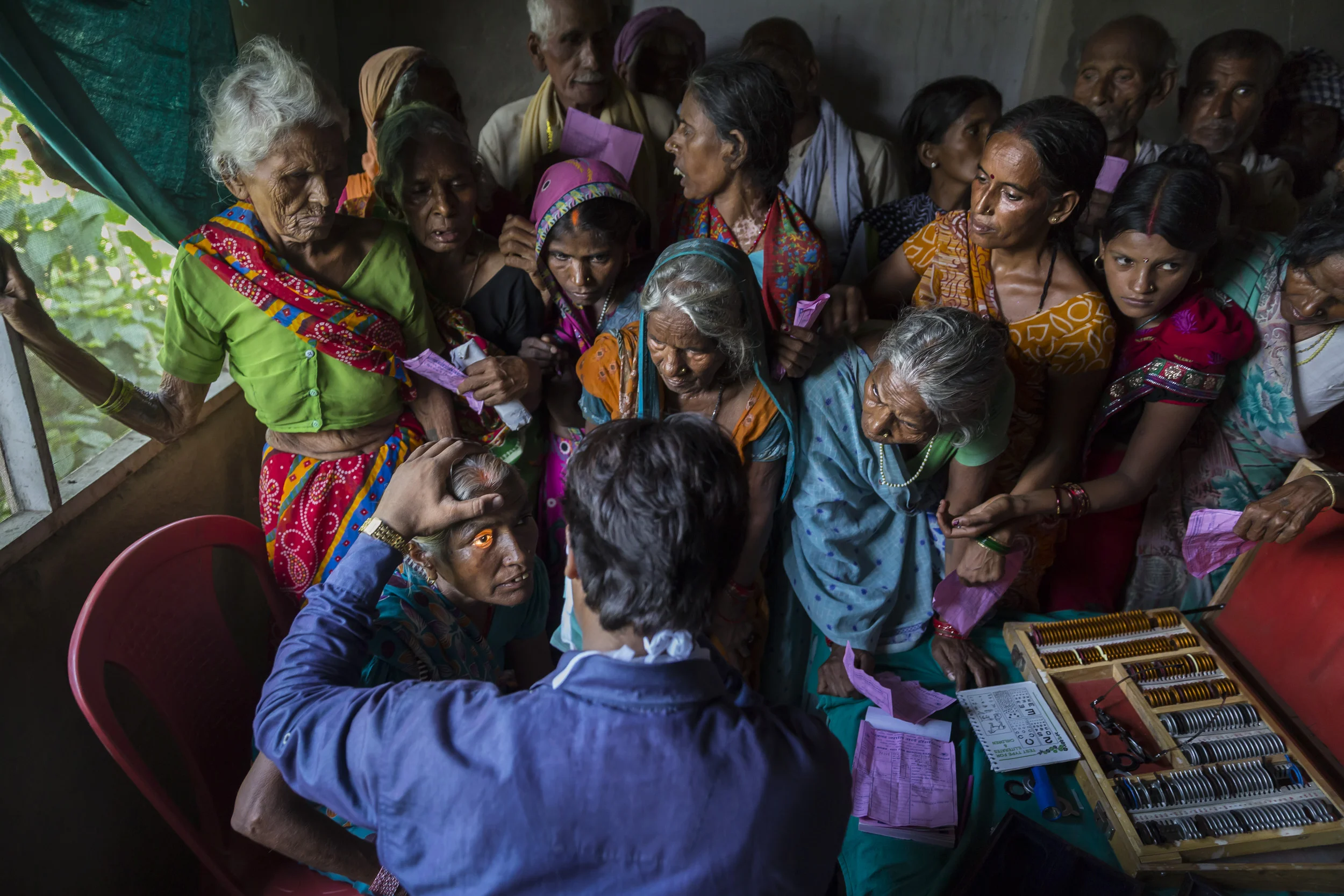 PATNA, INDIA, 10 SEPTEMBER 2014: Blind Indian boy Dablu Kuma, 8, and his mother make their way to and from a blindess camp on a remote river island where he is diagnosed with Cataracts and sent to hospital for surgery. (Photo by Brent Stirton/Report