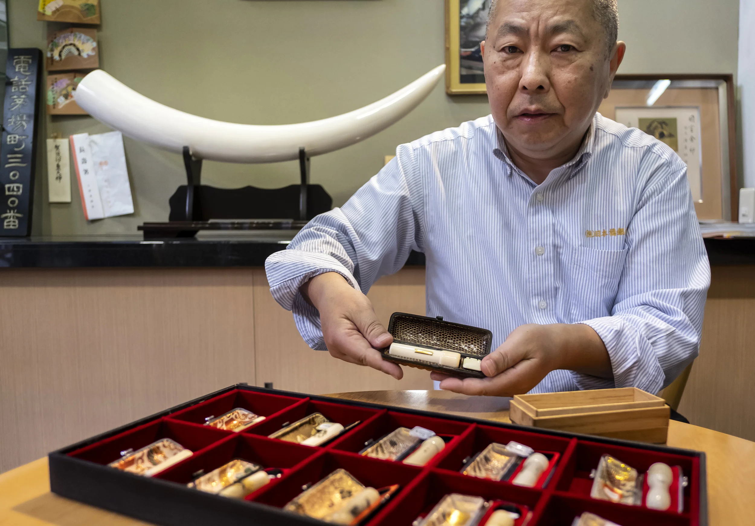 Tokyo, Japan, April 27 2018: Photographs from a visit to a specialized Hanko shop “Ginnando “at Kodemmacho, Nihonbashi area of Tokyo. At this store the most expensive ivory hanko with gold we saw came in a lizard and crocodile case. This is
called Z