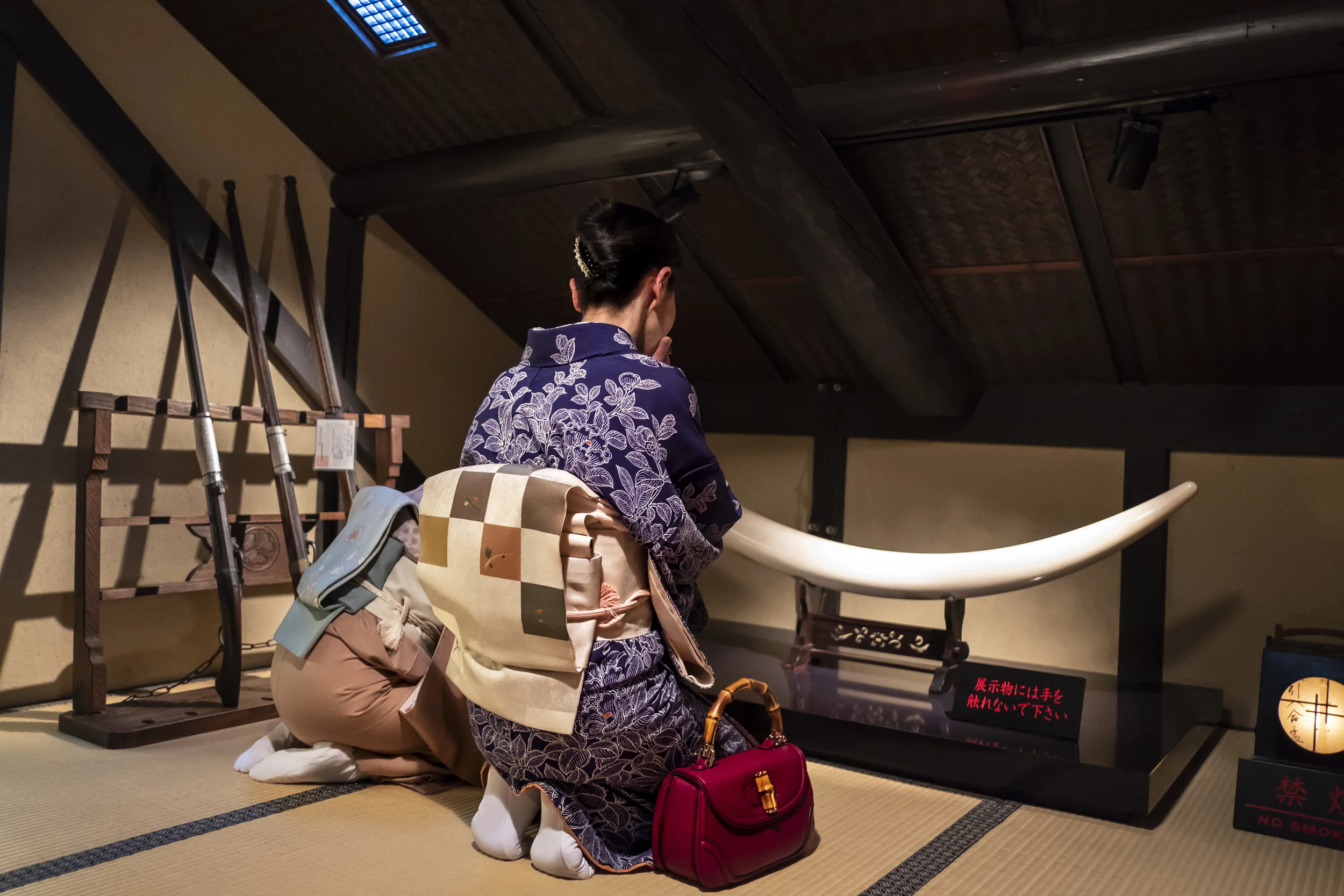 KYOTO, JAPAN, APRIL 2018: Two local Kyoto woman dressed in traditional kimono visit The Netsuke Art Museum, Kyoto. The majority of the high end carvings at the museum are made of ivory, both recent and older carvings. (Photo by Brent Stirton/Verbati