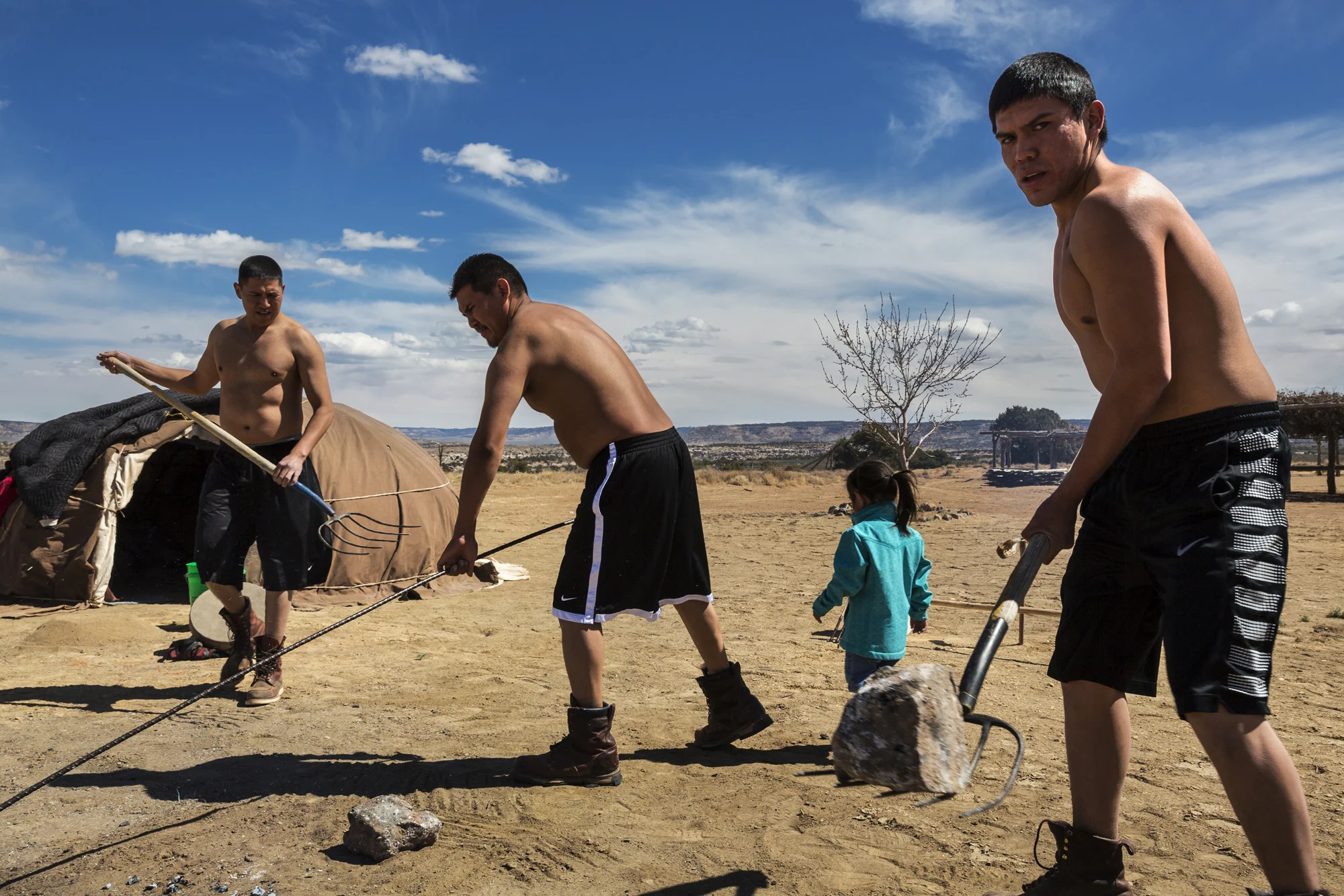 PINON, NAVAJO NATION, ARIZONA, 5 APRIL 2014: Scenes from a Navajo sweat lodge and pipe smoking ceremony, Pinon, Arizona. The sweat lodge is a purification ritual involving hot rocks and sage, as well as drumming and chanting. The Pipe smoking ceremo
