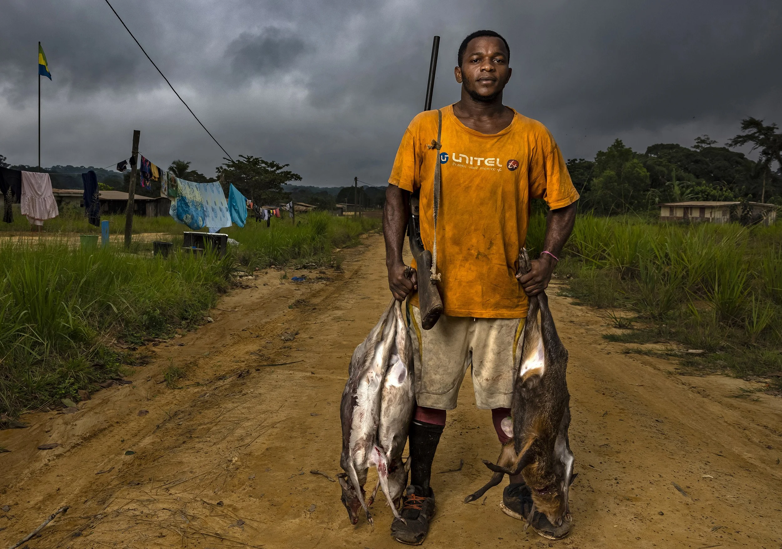 VILLAGE NDAMBI, AREA OF LASTOURSVILLE, GABON, 30 JUNE 2021: Rick Lindzondzo is a talented bushmeat hunter , he is seen with the Duiker and Antelope he killed the previous night in the forest around the village of Ndambi, one of a number of villages
