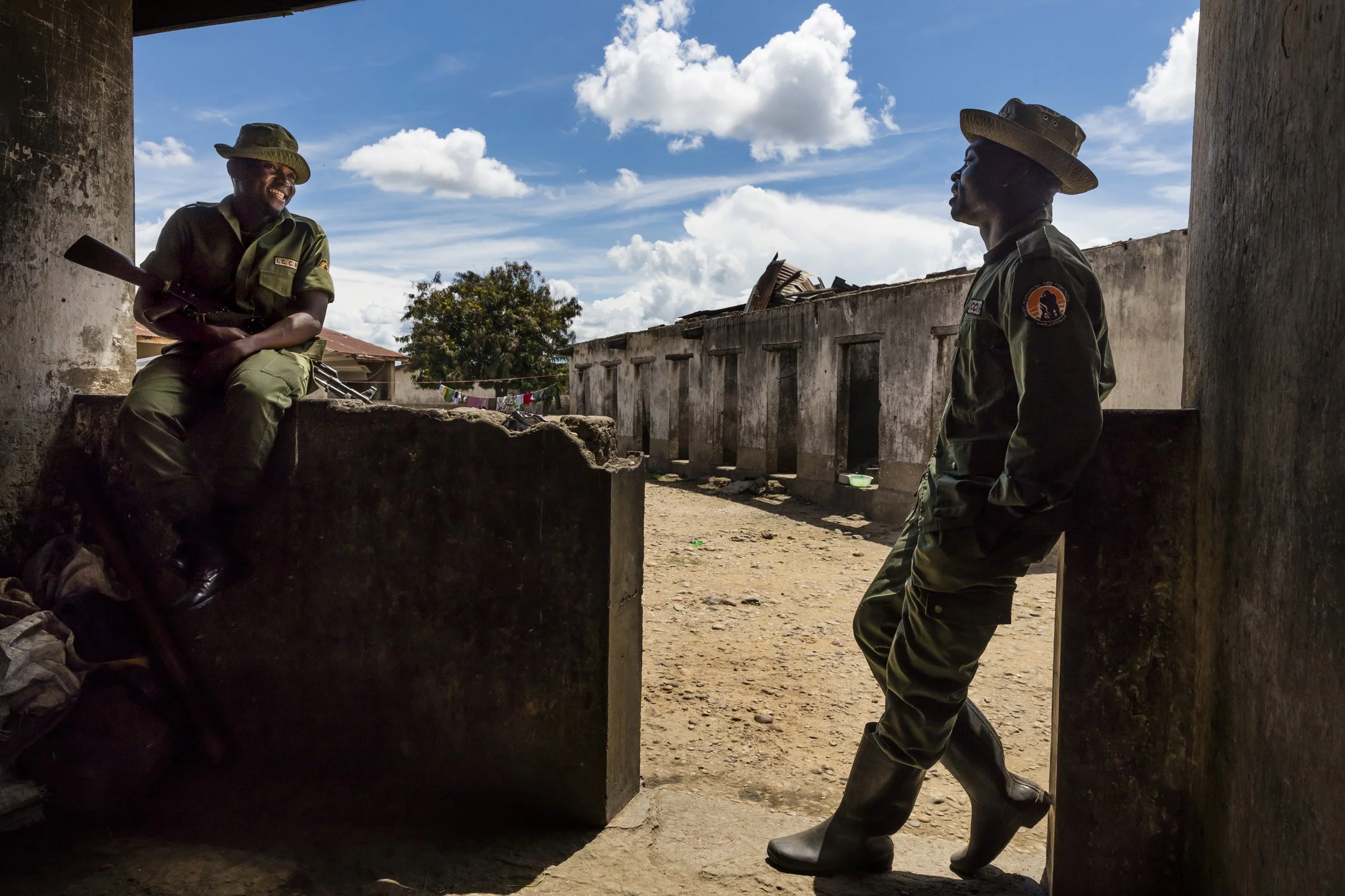 RWINDI, VIRUNGA NATIONAL PARK, NORTH KIVU, DR CONGO, 2 DECEMBER 2015: ICCN Congolese conservation rangers are seen outside their primitive living quarters at their Rwindi basecamp. Rwindi is a hardship posting for the Rangers, with very primitive fa
